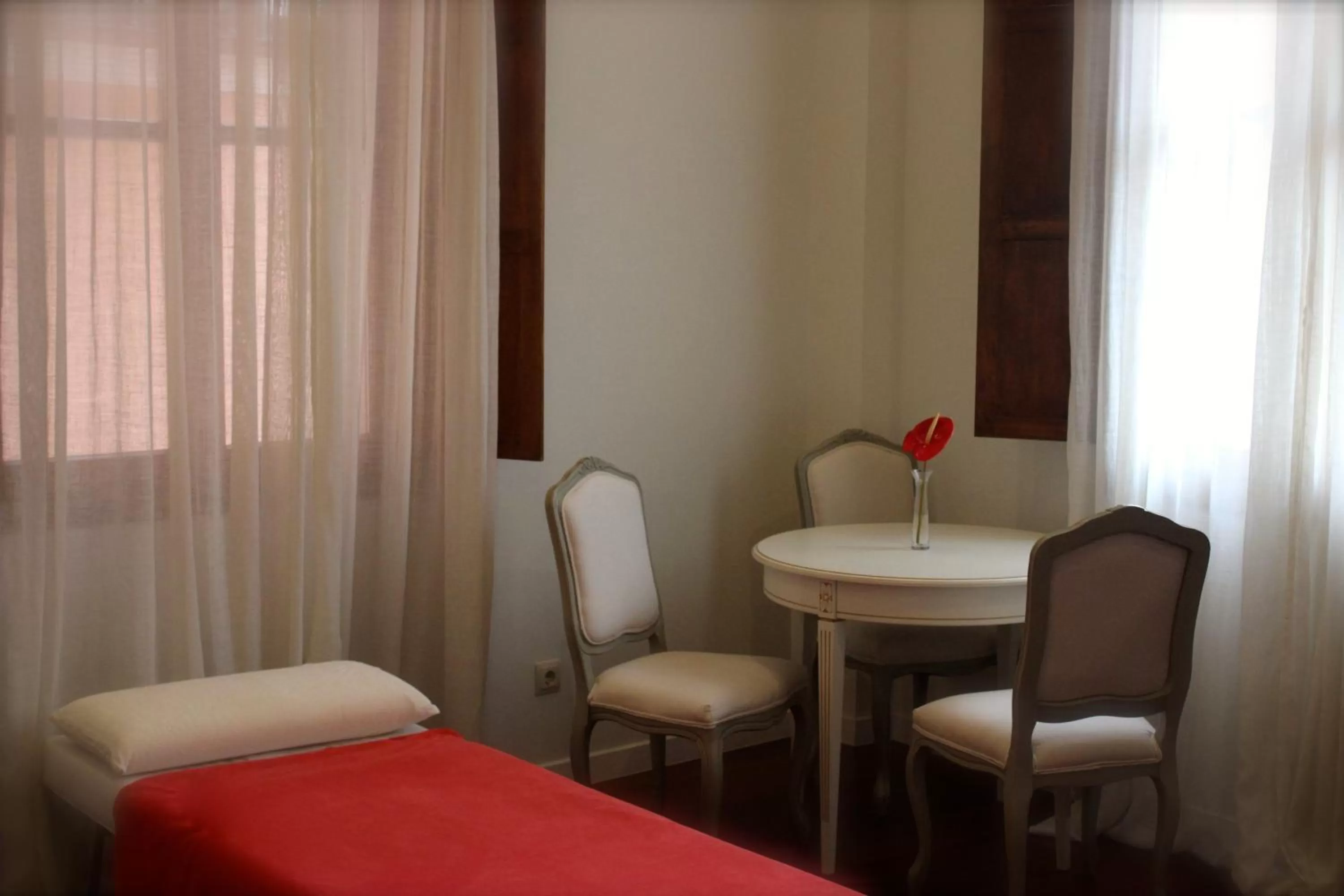 Bed in Casa Urbana Suites