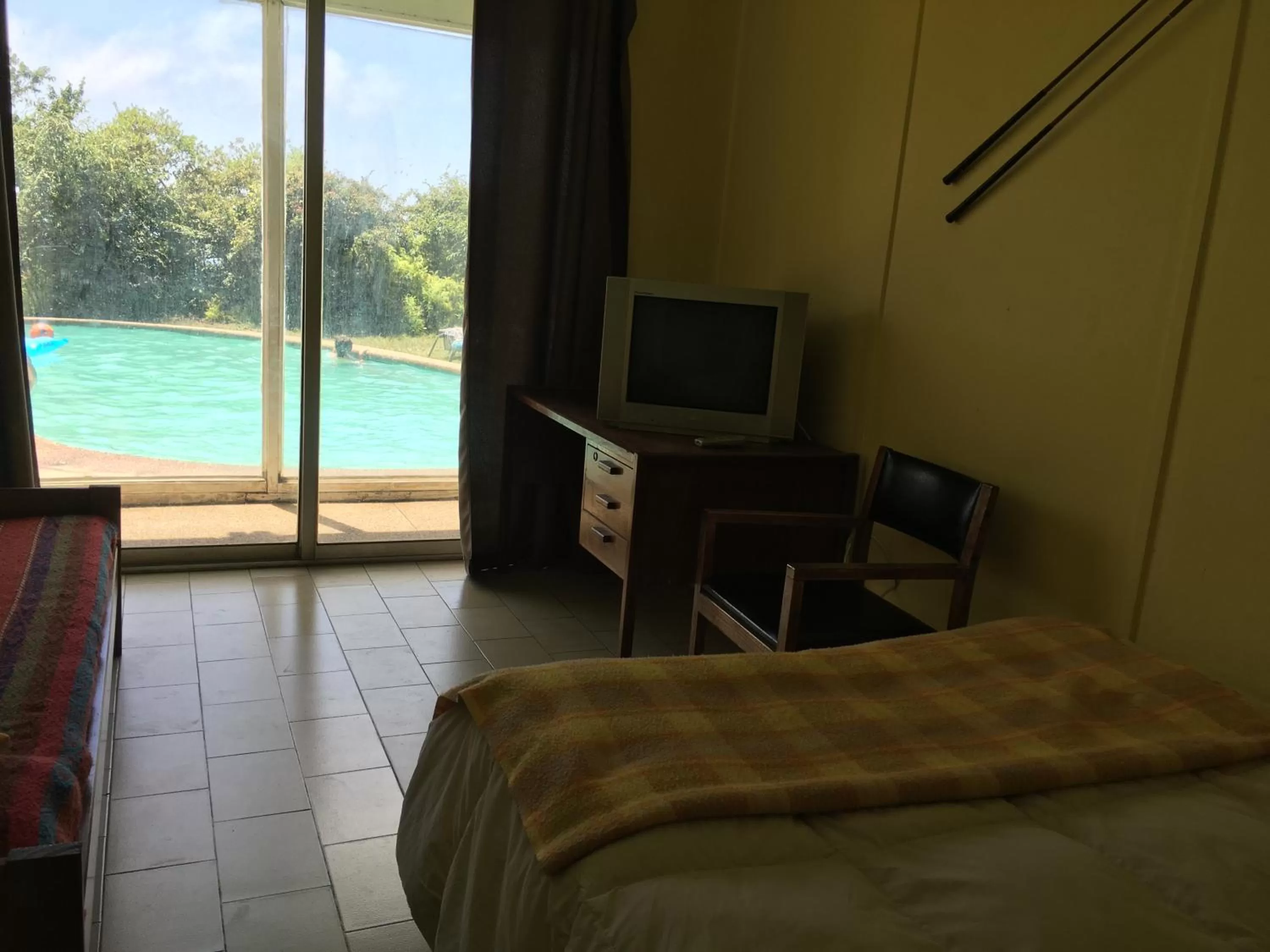 Bedroom, TV/Entertainment Center in My Father's House Bed & Breakfast