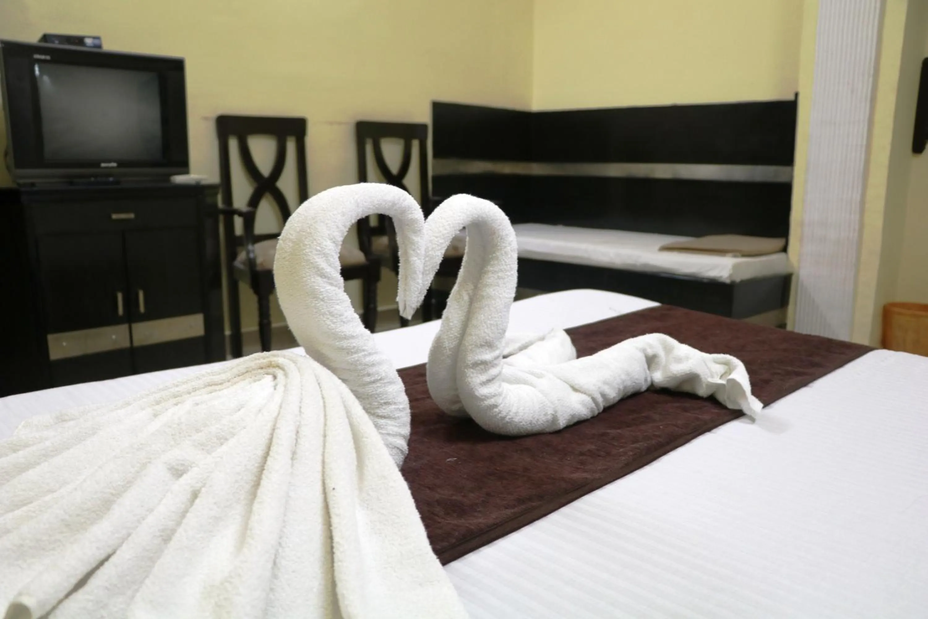 Bed in Hotel Vaishnavi