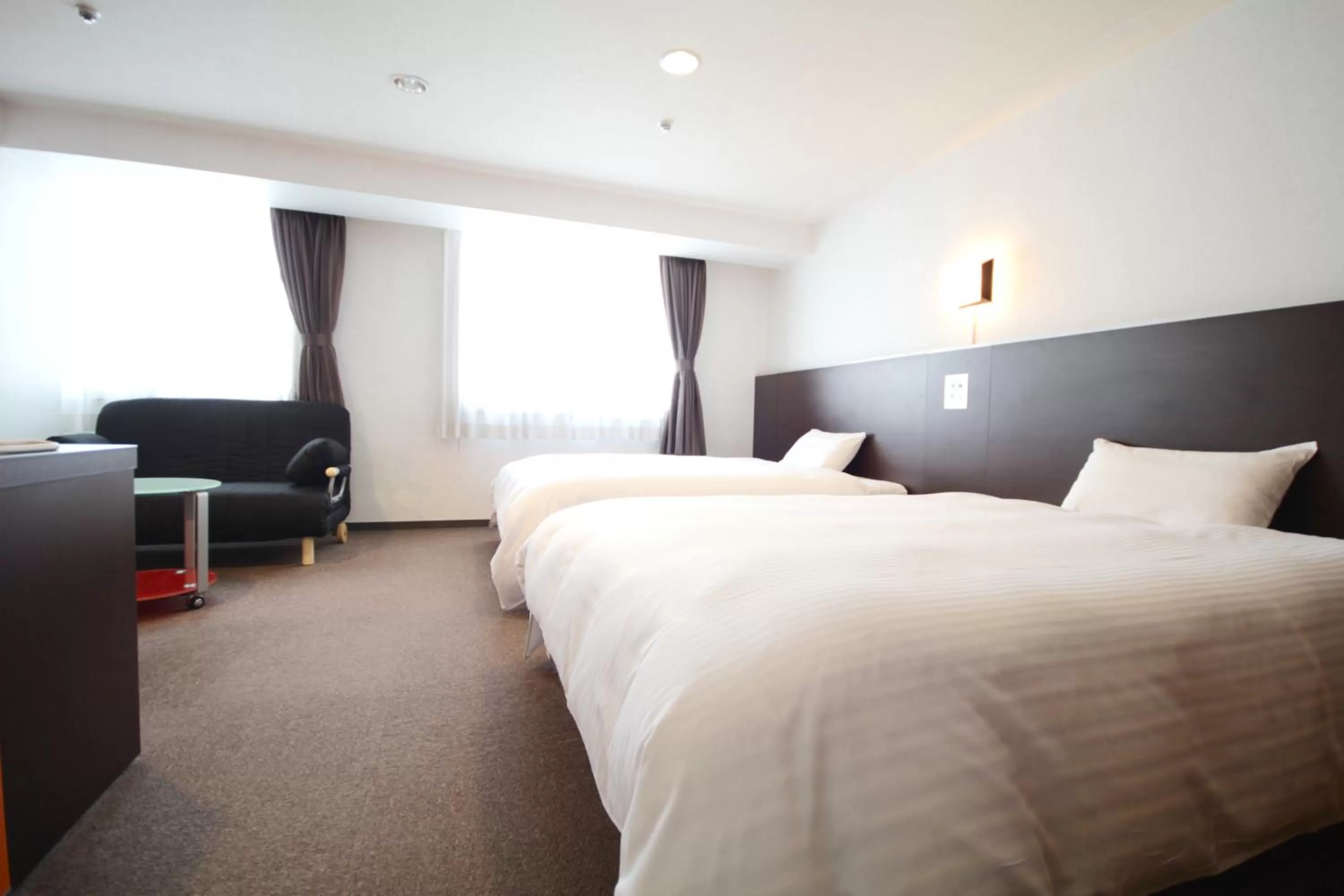 Bed in Green Rich Hotel Kagoshima Tenmonkan