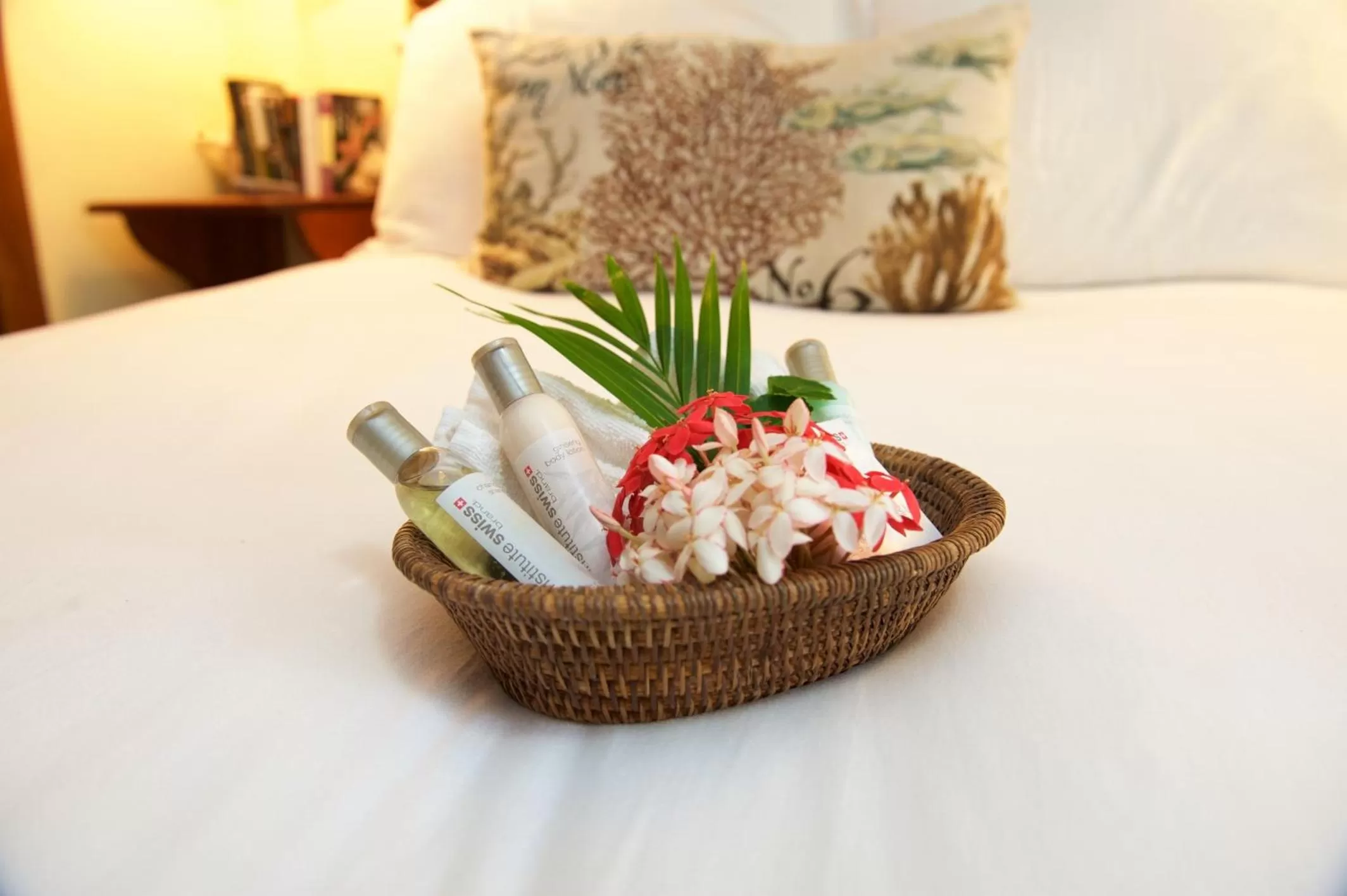 Bed in The Palms Oceanfront Suites