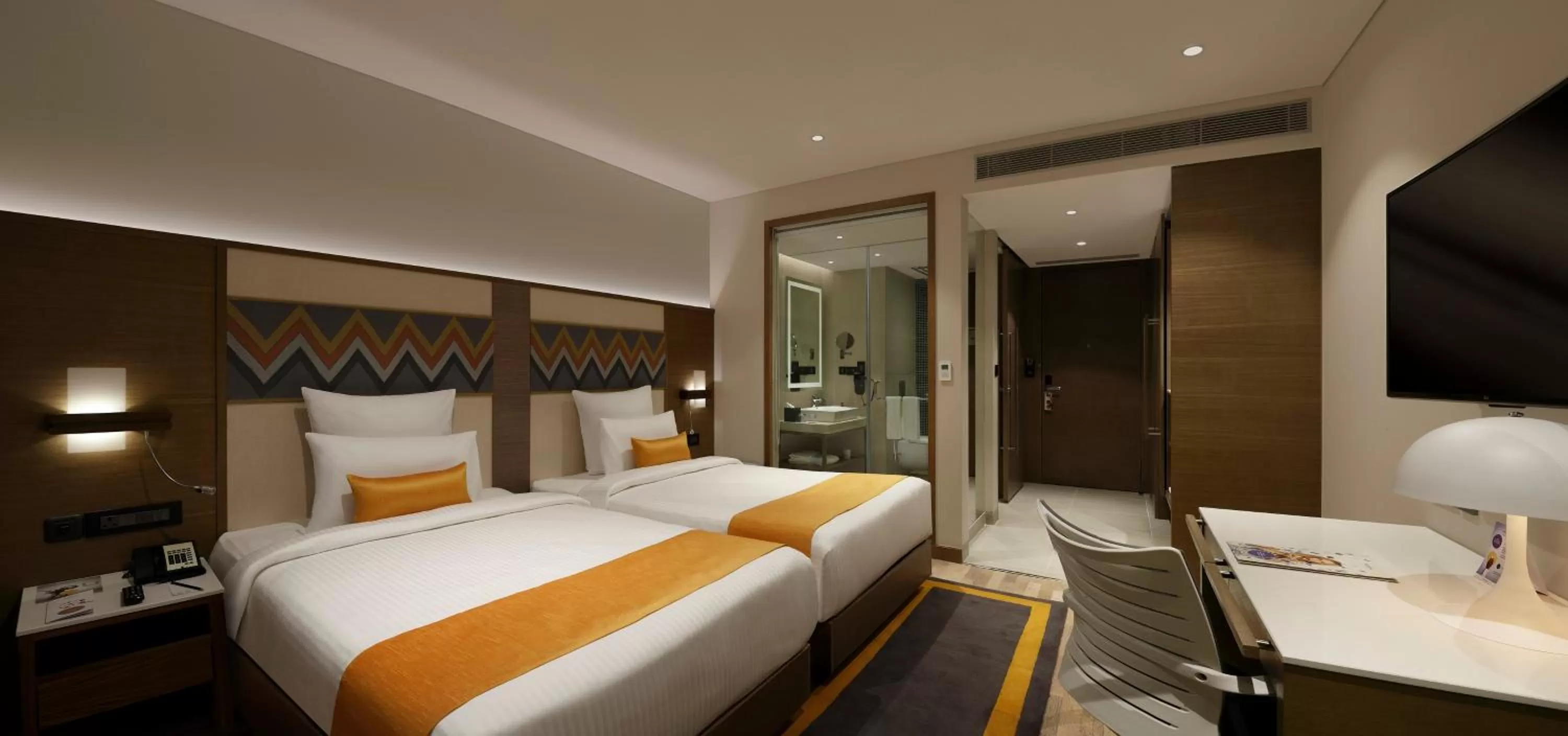 Photo of the whole room, Bed in Novotel Guwahati GS Road