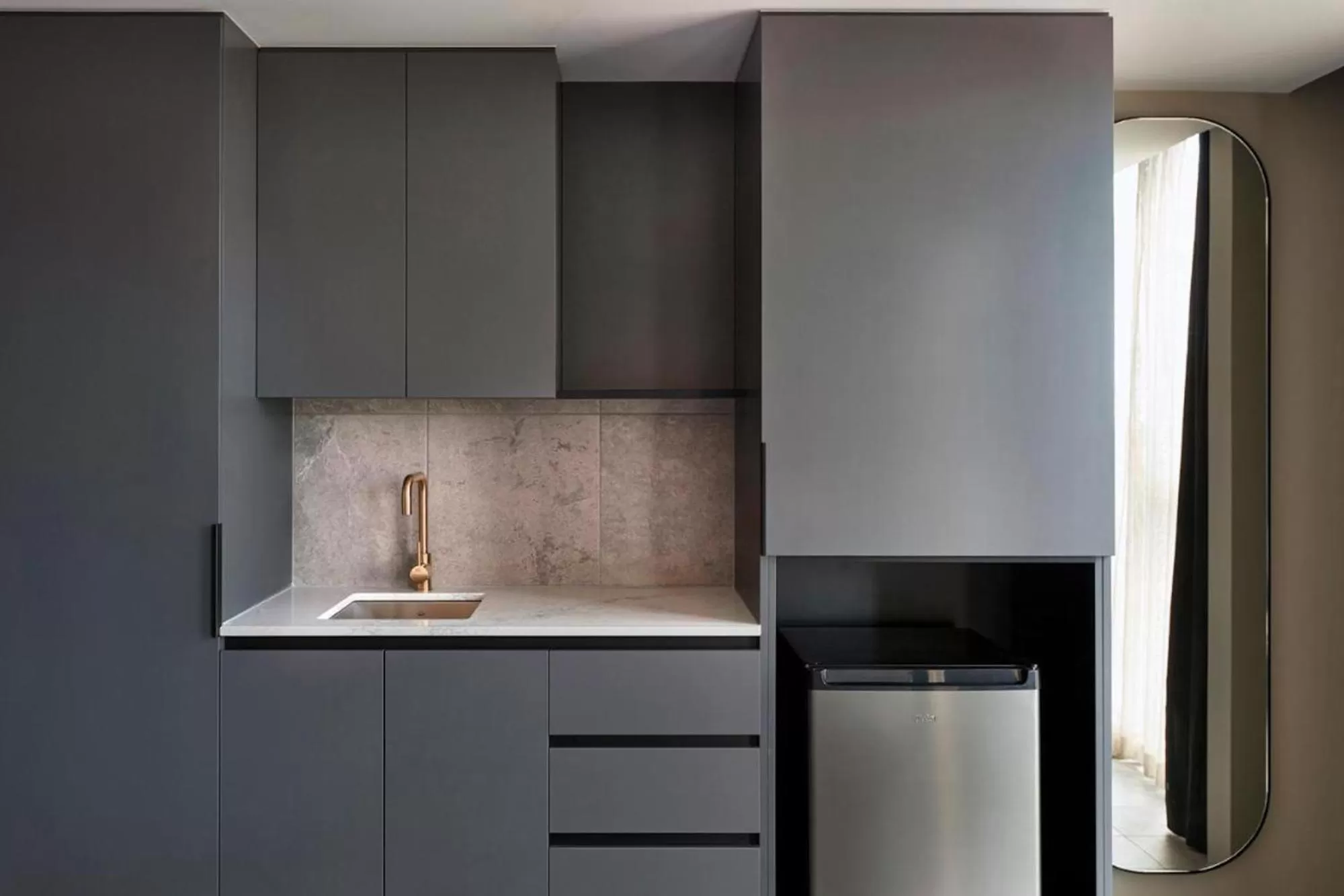 Kitchen or kitchenette in Melbourne City Apartment Hotel