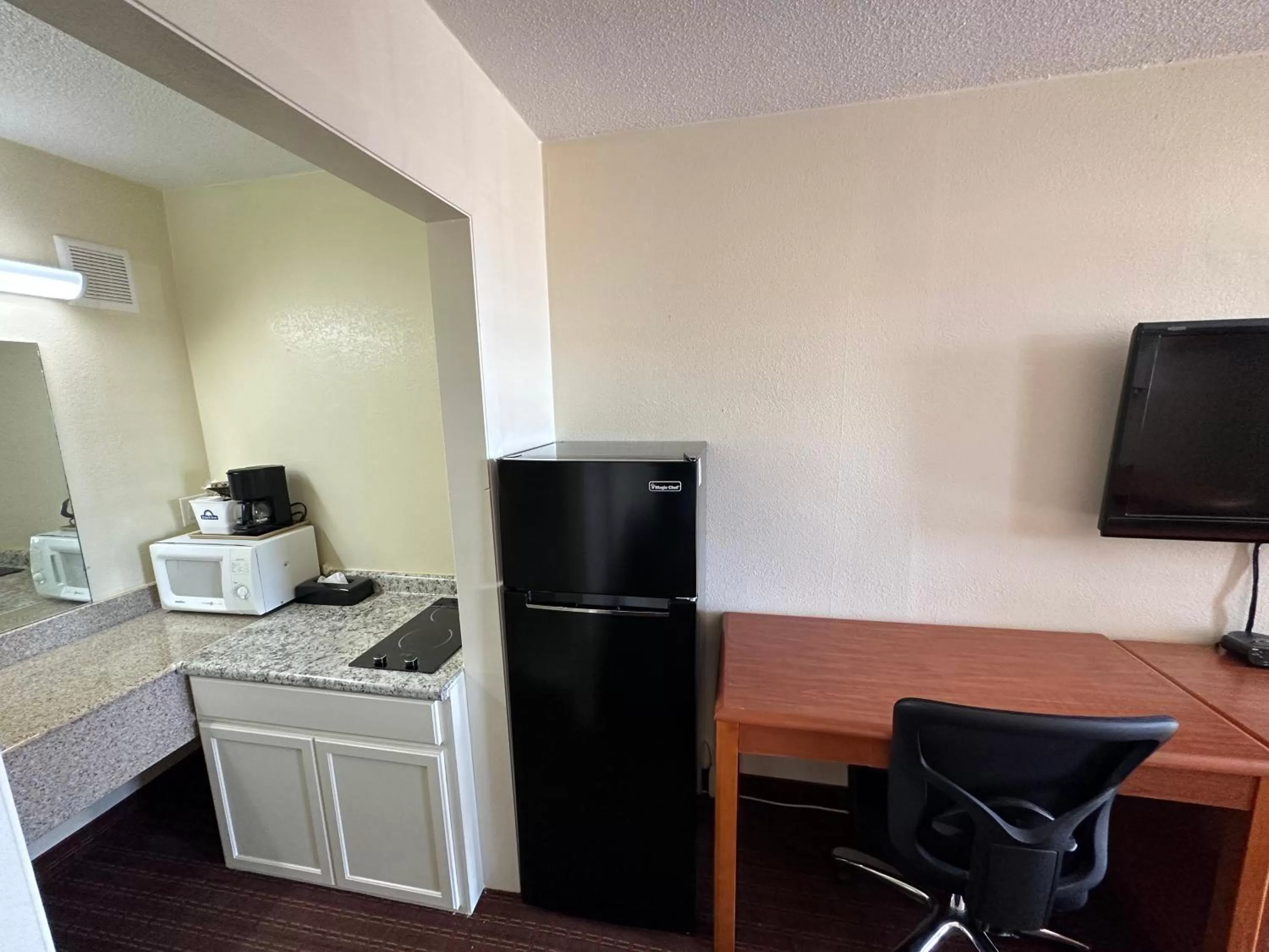 Kitchen or kitchenette in Sunrise Extended Stay