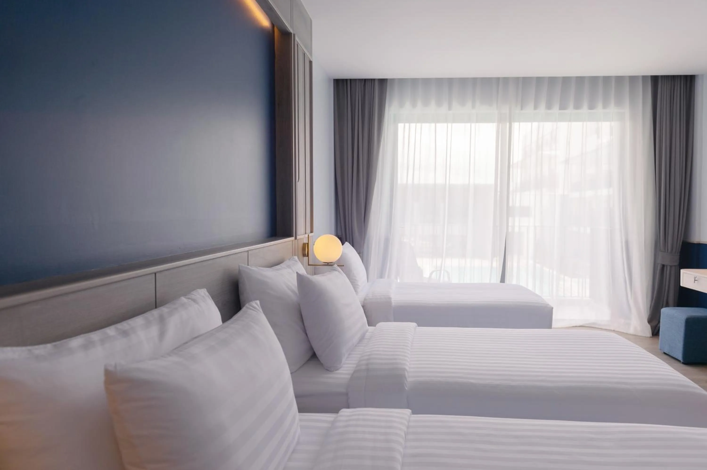 Bed in Seabed Grand Hotel Phuket - SHA Extra Plus