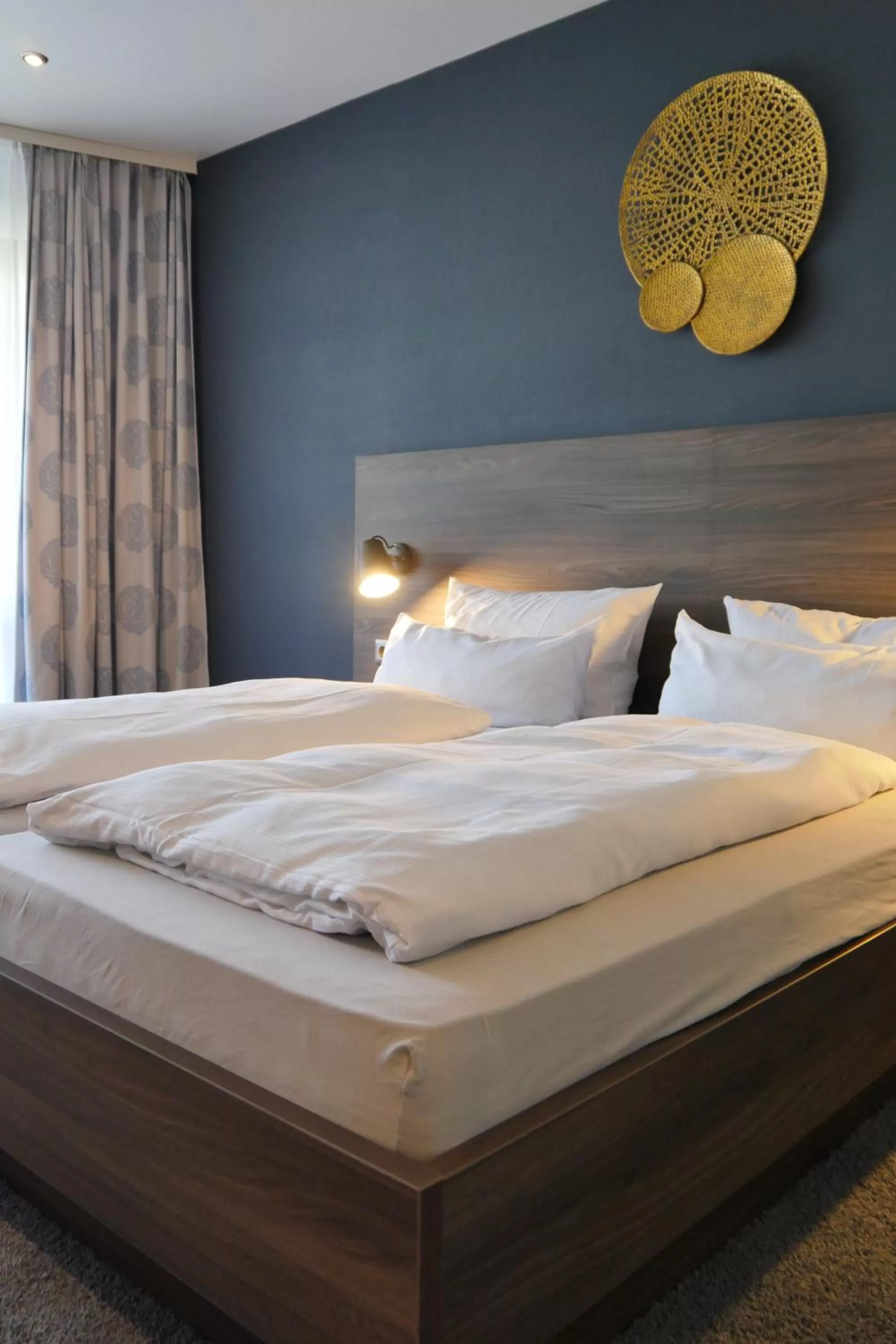 Bed in NaturKulturHotel Stumpf