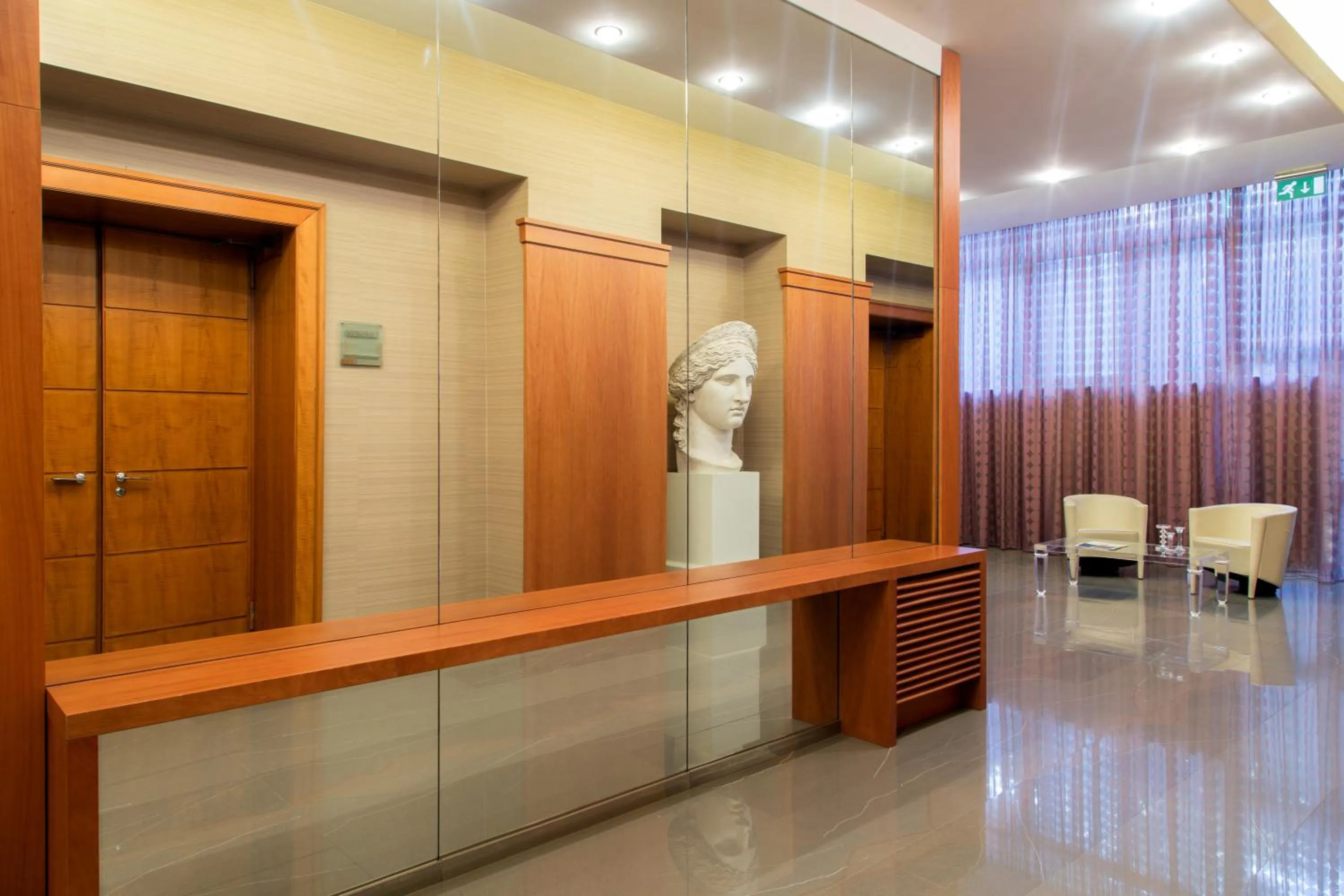 Communal lounge/ TV room in Enea Hotel Pomezia