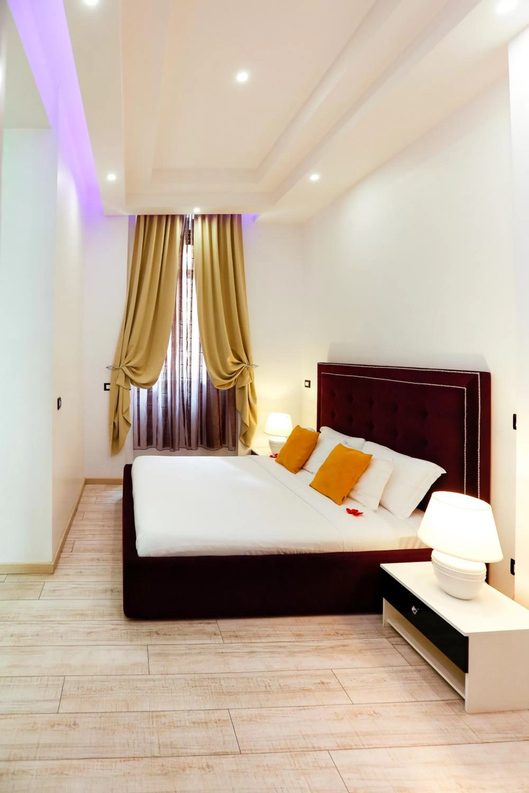 Bed in Escape Luxury Suite - CA Domus Collection