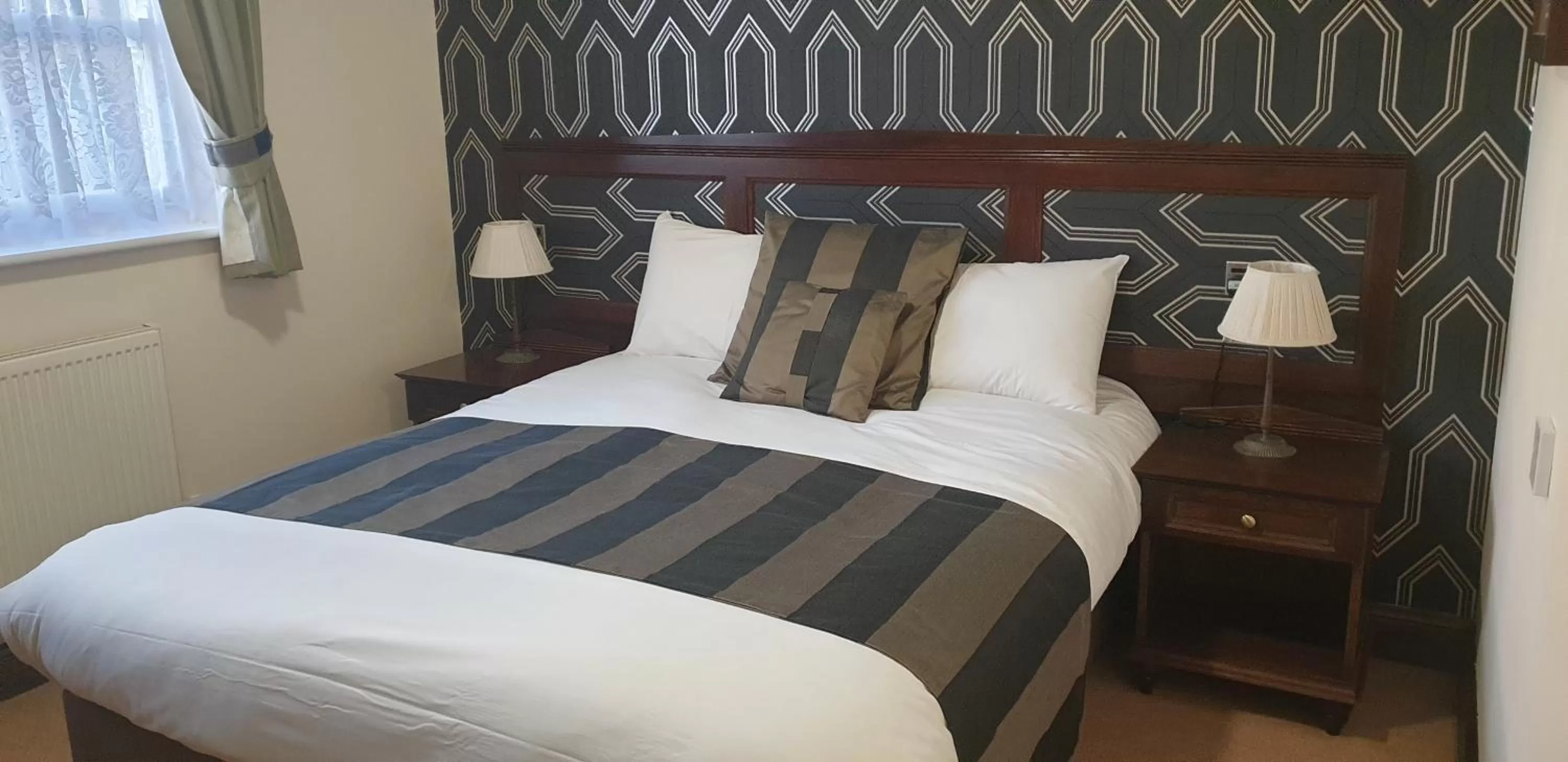 Bed in The Flying Bull Inn