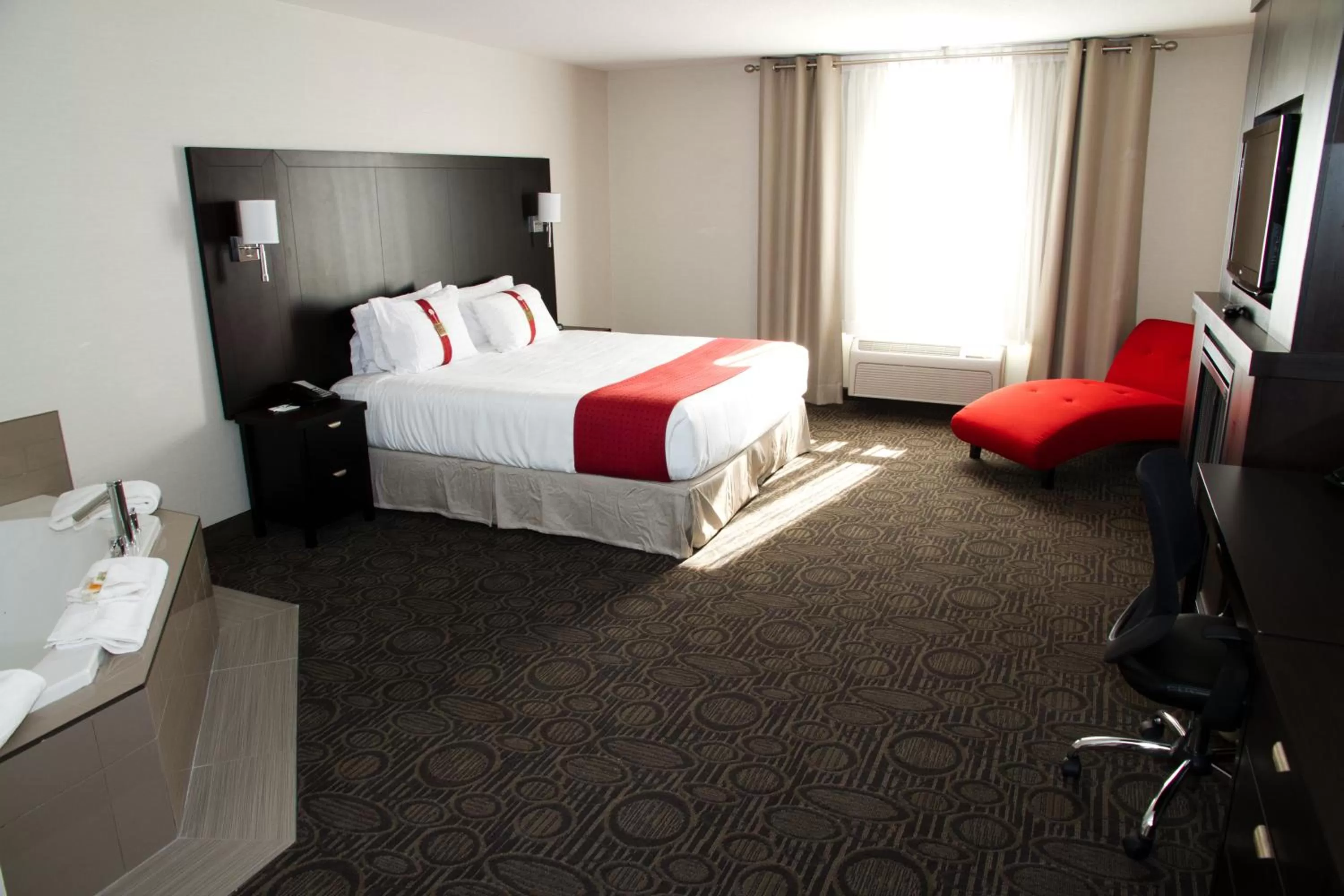 Bedroom, Bed in Holiday Inn Hotel & Suites Red Deer by IHG