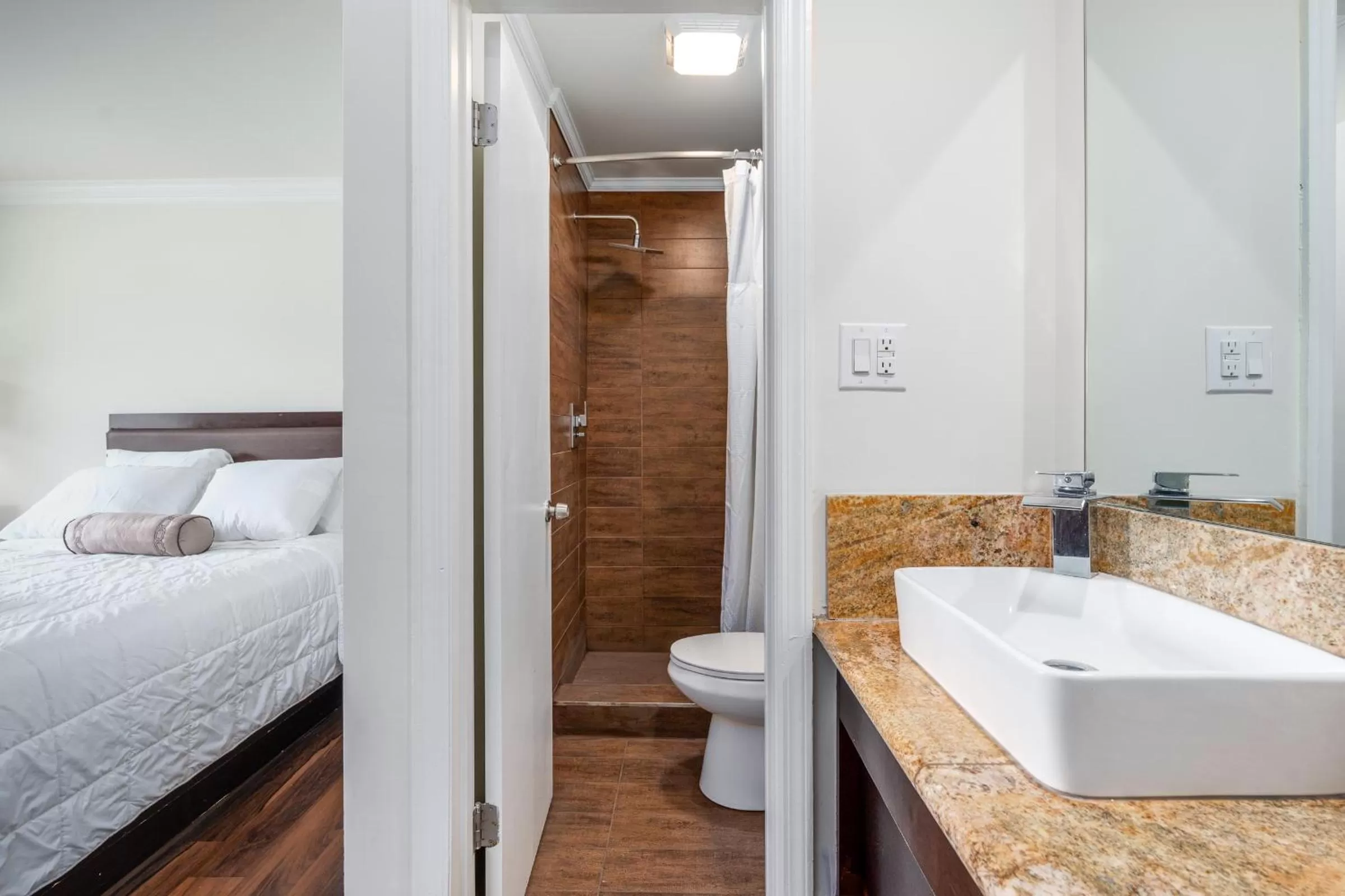 Toilet, Bed in Crewe Boutique Inn