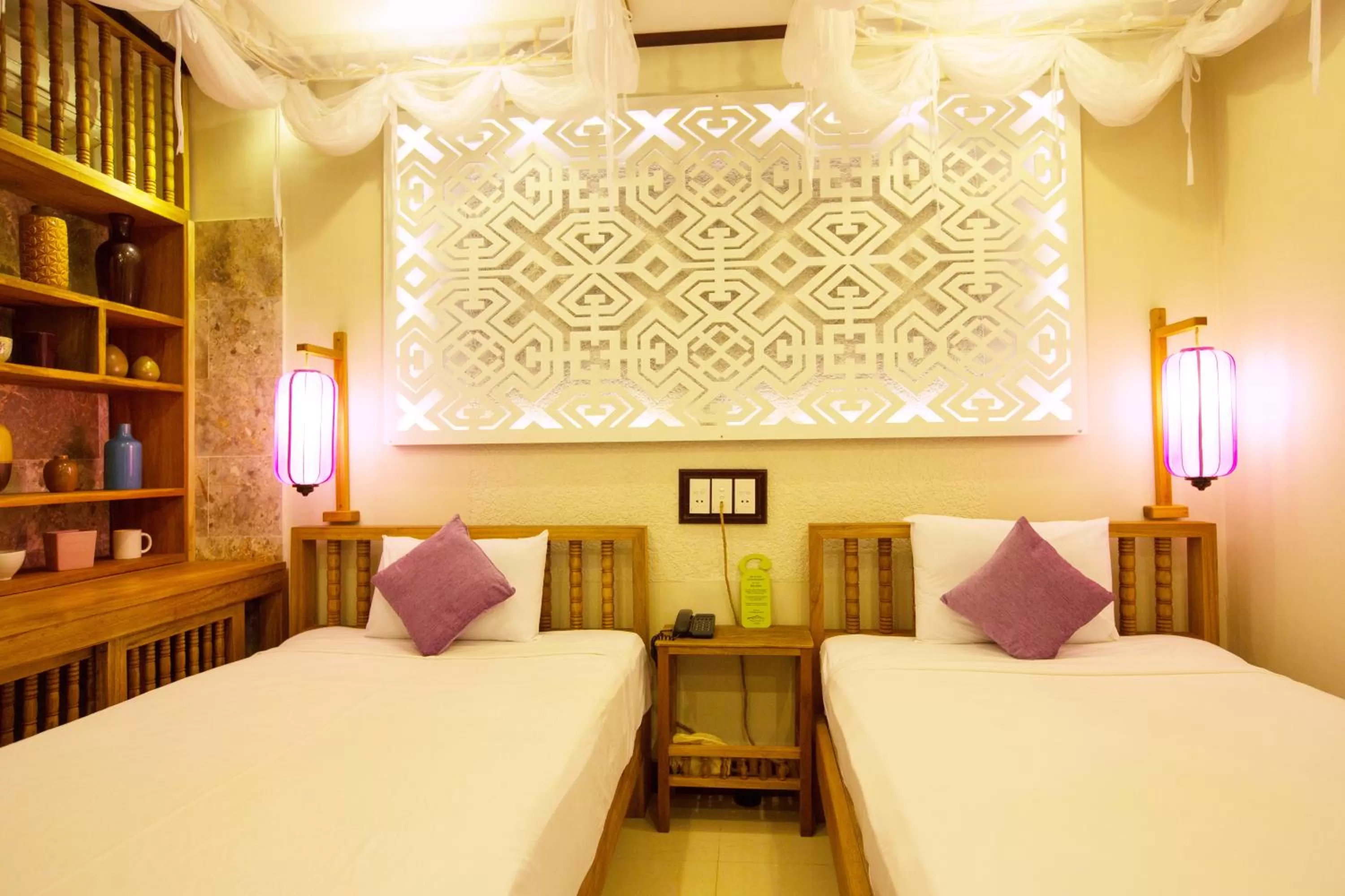 Bed in Hoi An Pho Library Hotel