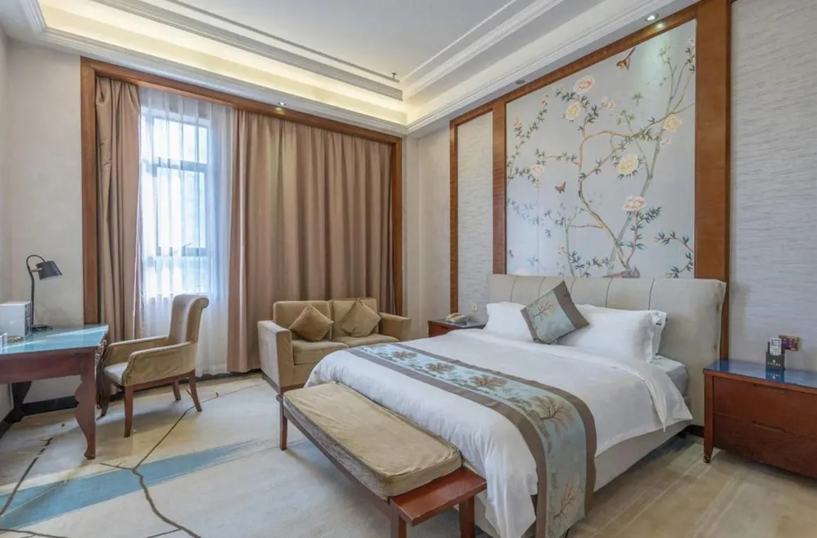 Bedroom in Guangzhou Nuomo International Hotel-Canton Fair Free Shuttle Bus