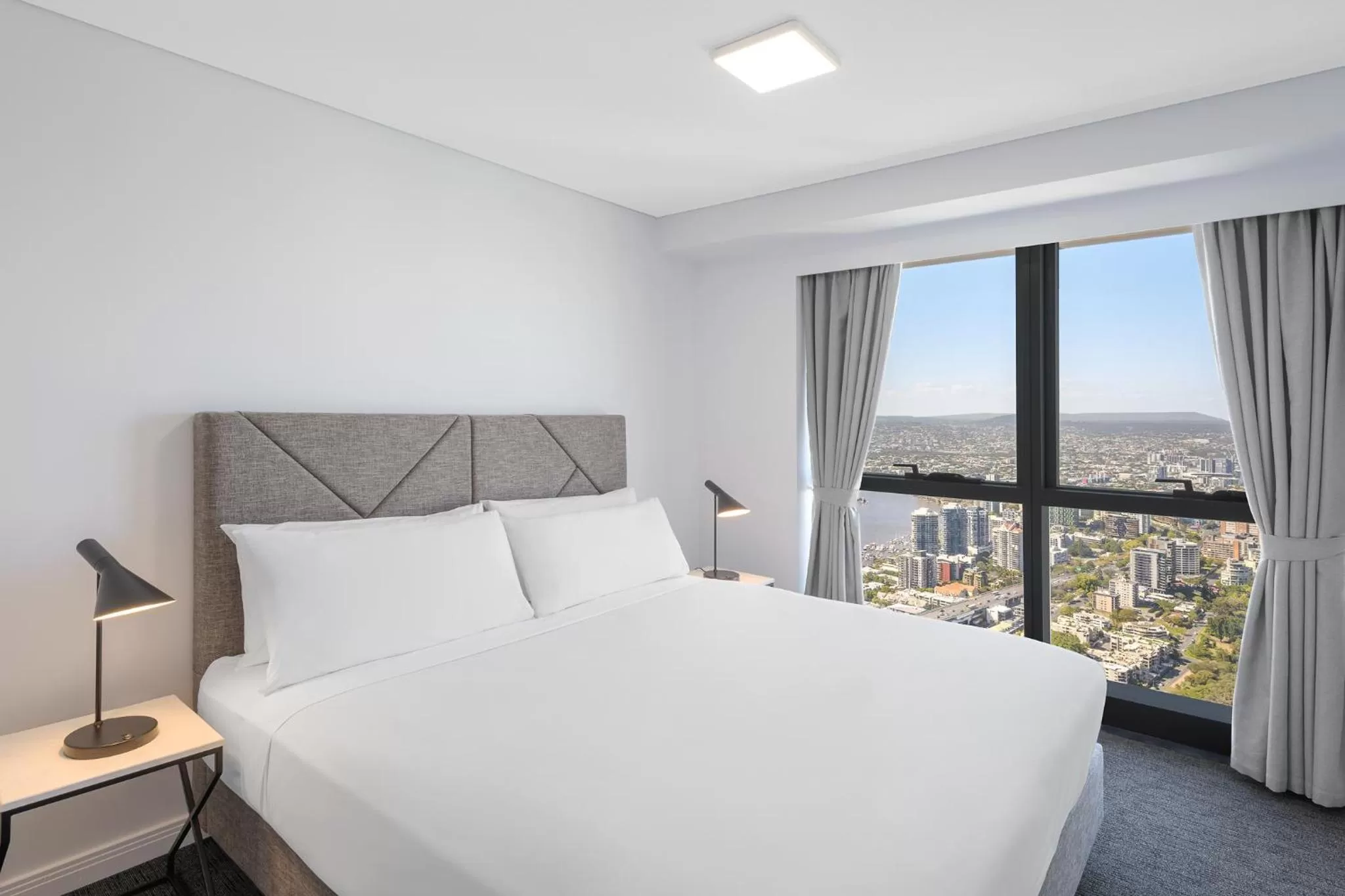 Bed in Meriton Suites Adelaide Street, Brisbane