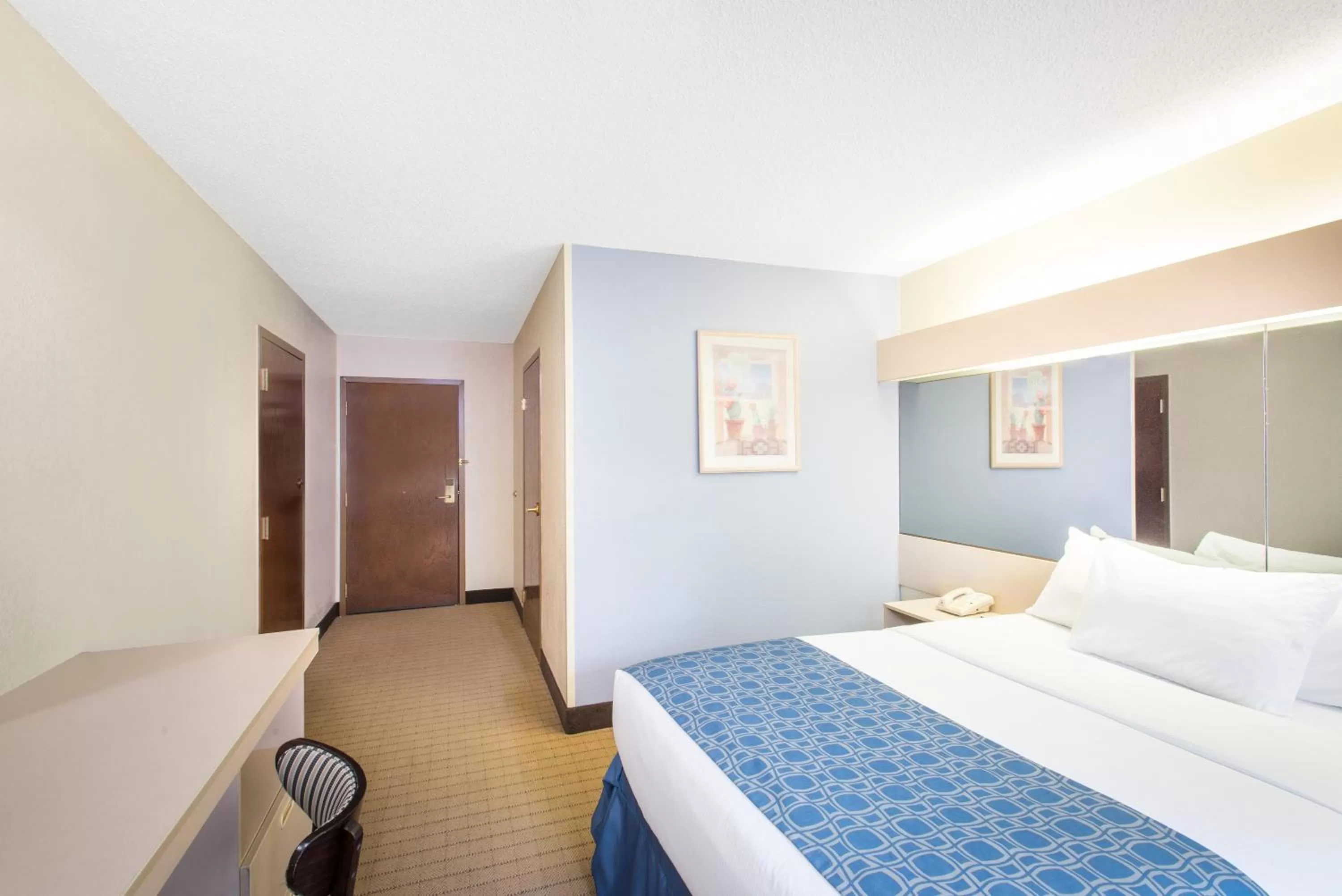 Bed in Microtel Inn & Suites by Wyndham