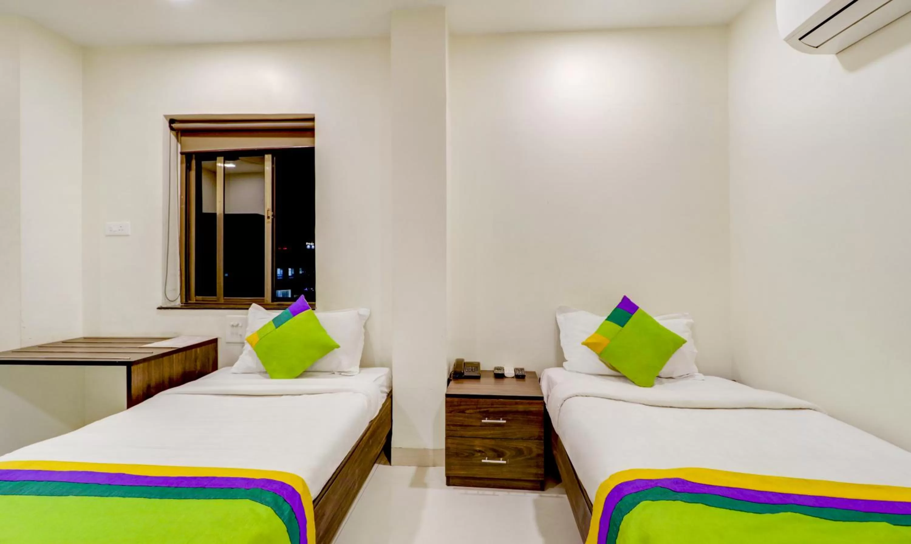 Bed in Treebo Trend Orange City