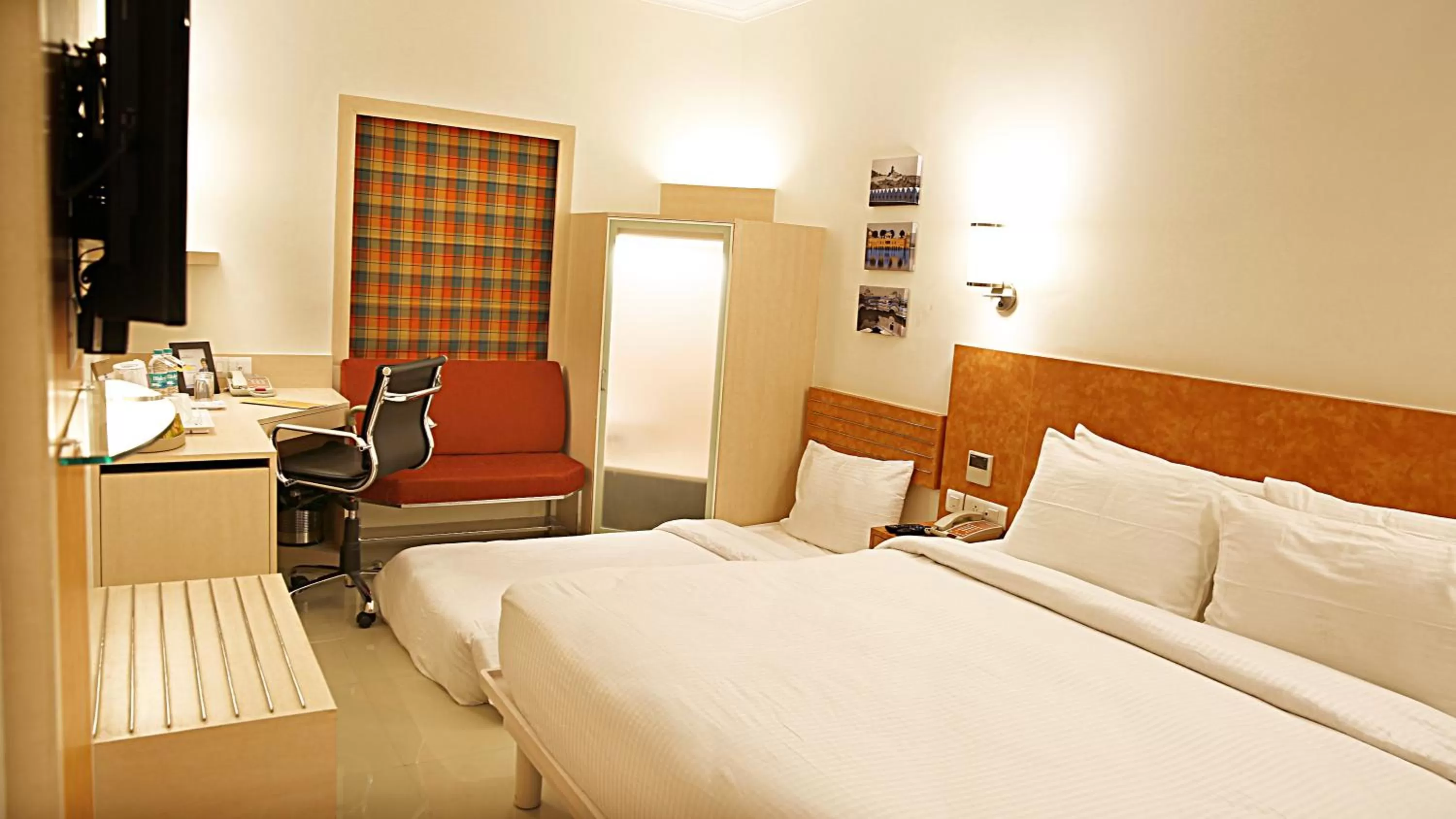 Bed in Nirwana Hometel Jaipur- A Sarovar Hotel