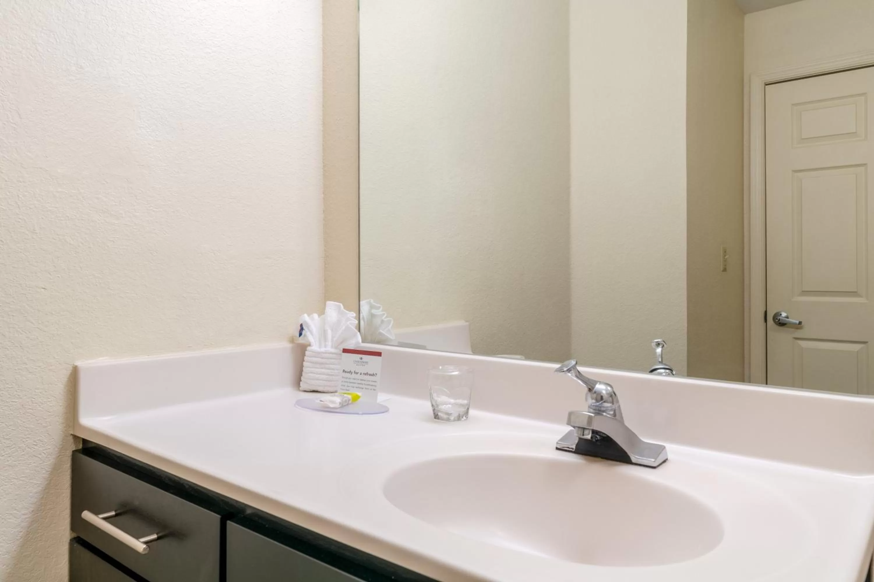 Bathroom in Candlewood Suites Washington-Fairfax by IHG