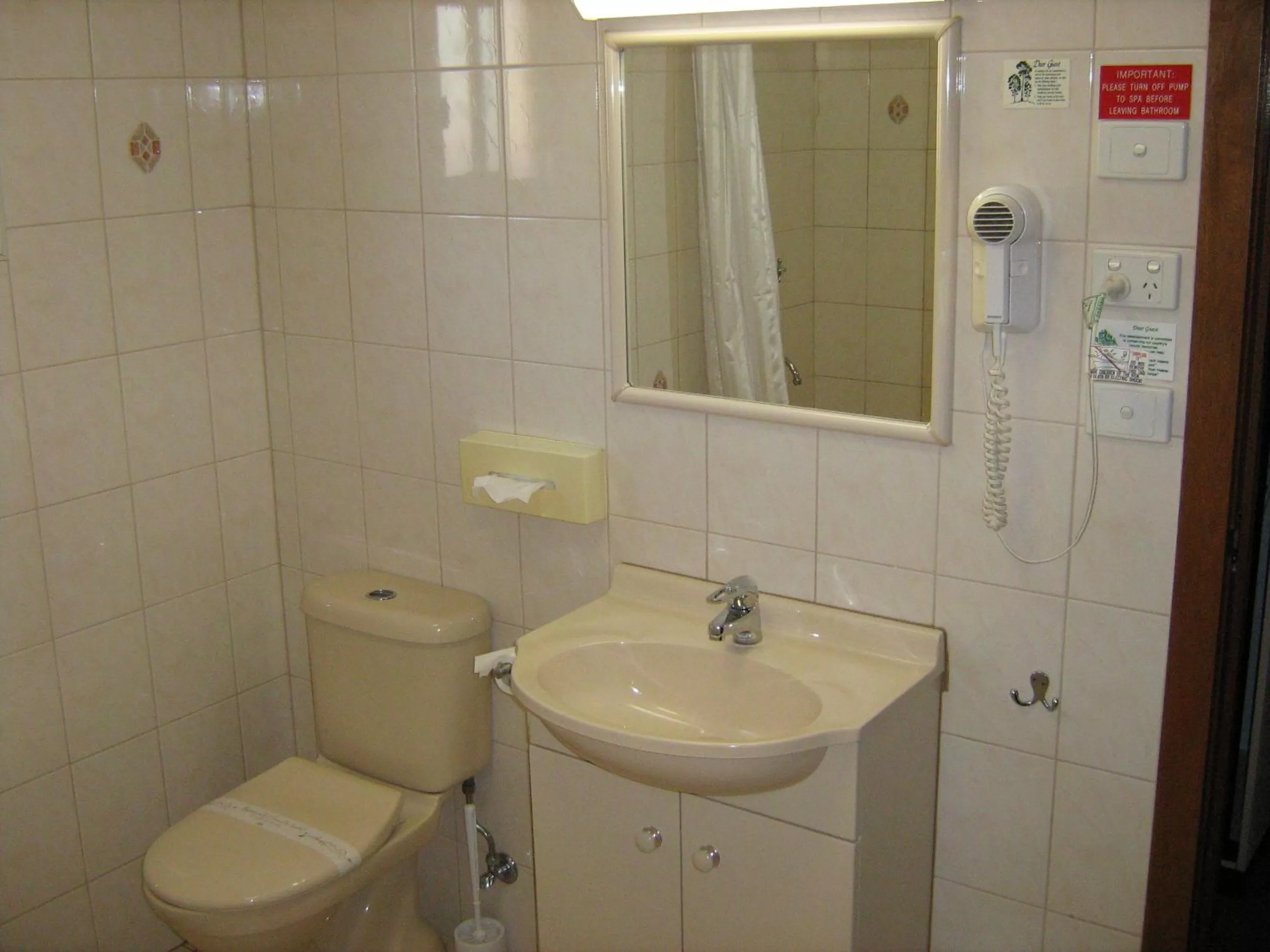 Bathroom in Highway Inn Motel