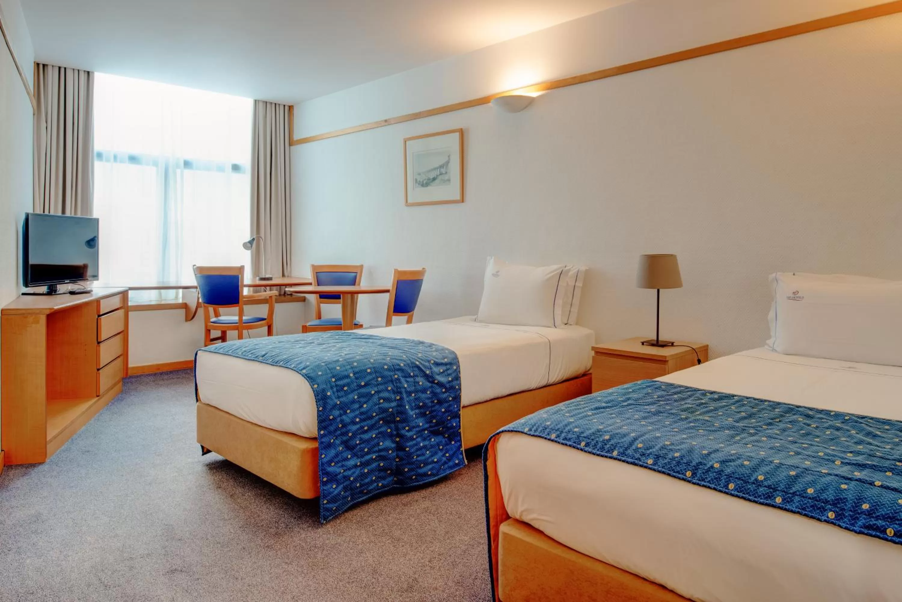 Bed in VIP Executive Eden Aparthotel