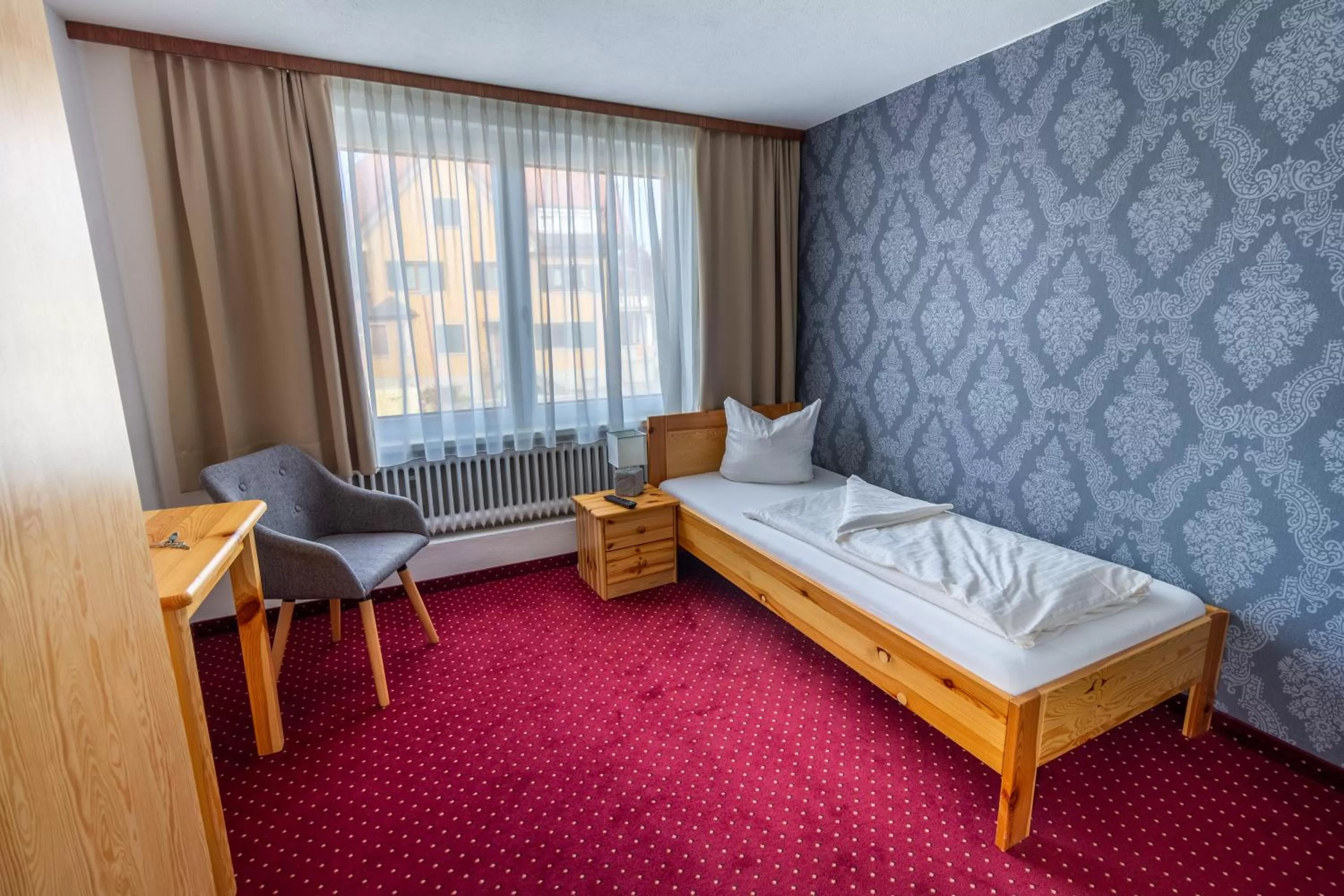 Photo of the whole room, Bed in Hotel Pension Löwen in Sulz