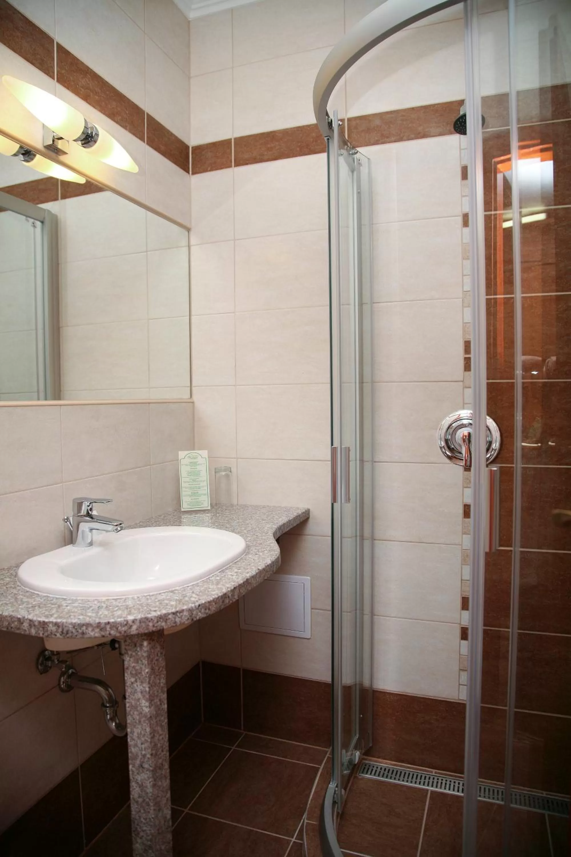 Bathroom in Lugas Hotel