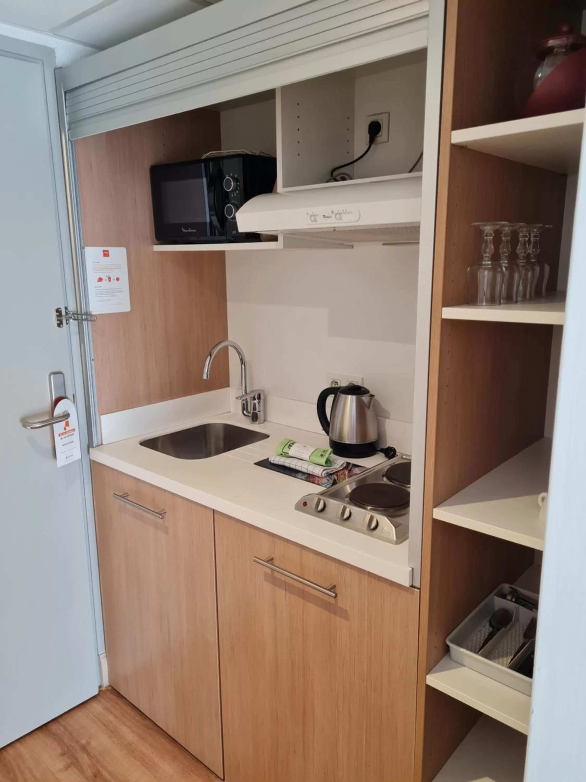 Kitchen or kitchenette in Apparthotel Privilodges Le Royal