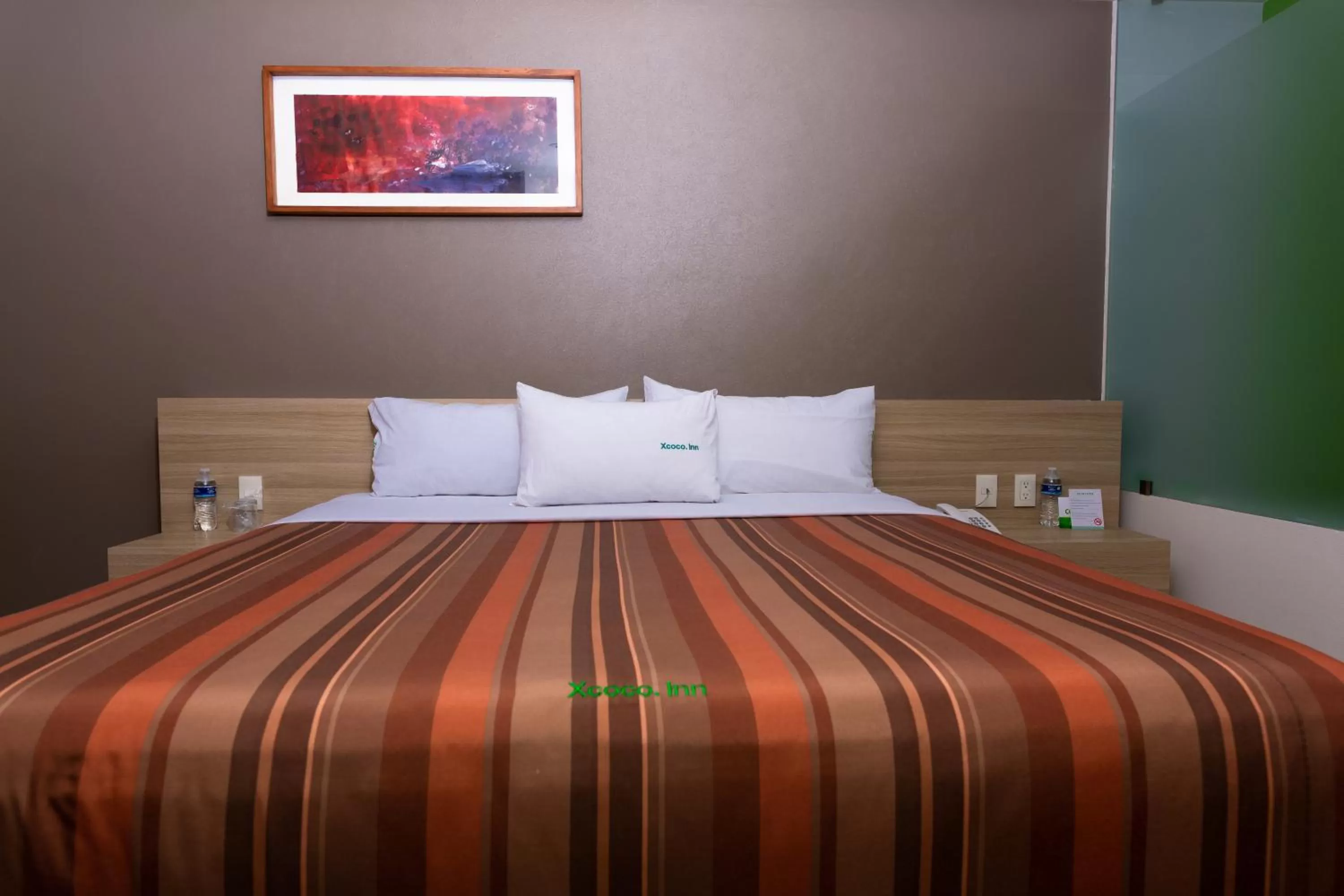 Bed in Hotel Xcoco Inn