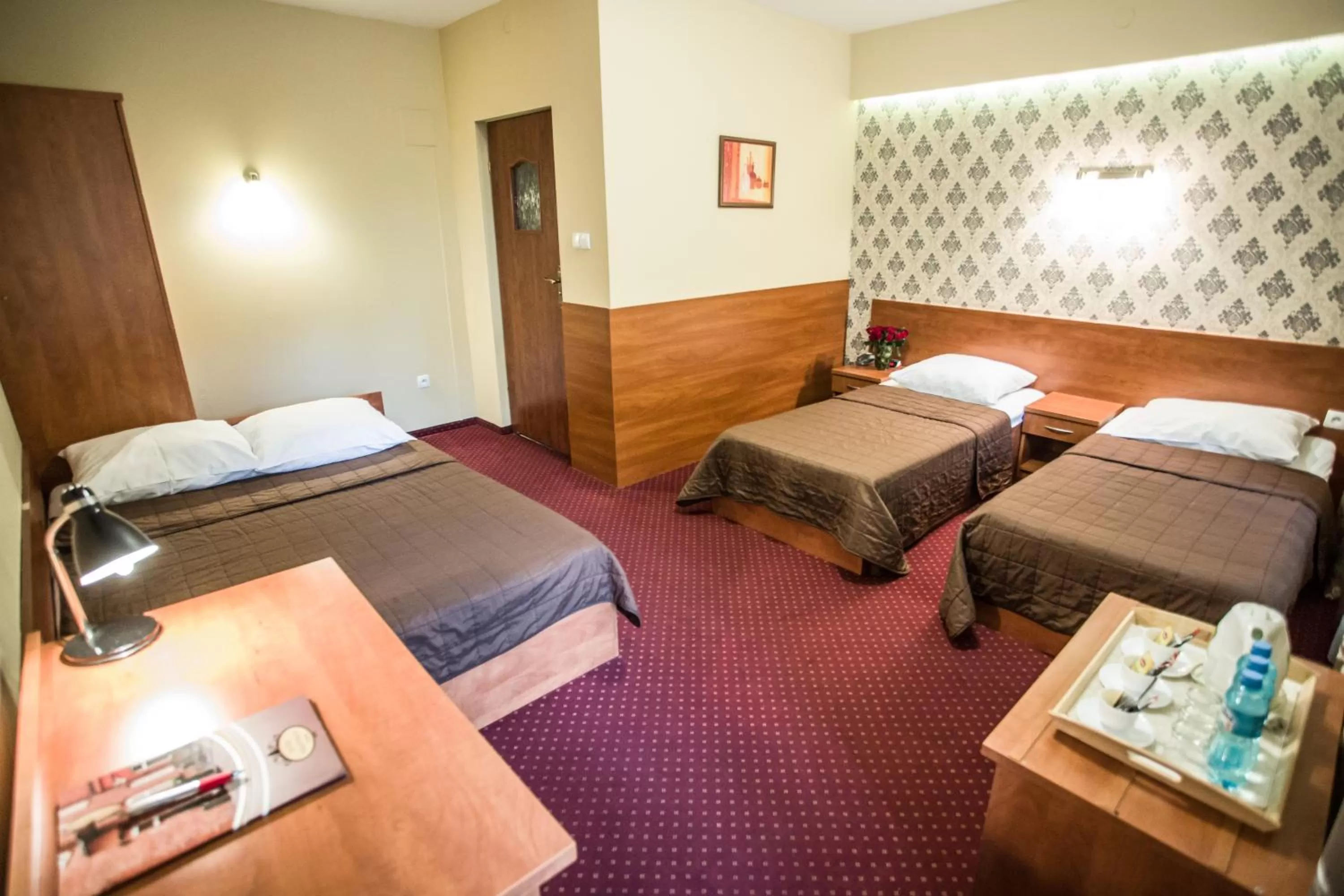 Bed in Hotel Maksymilian