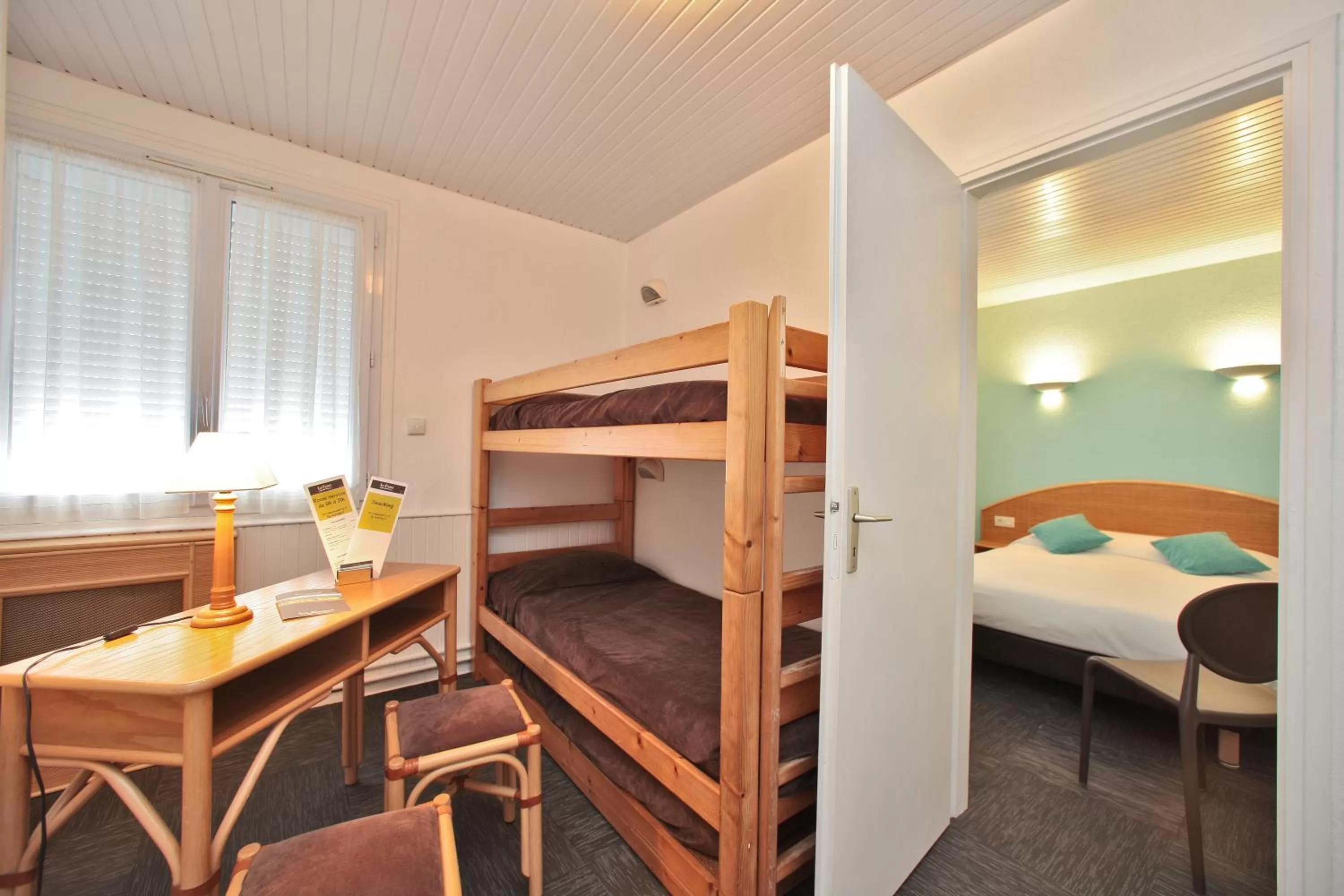 Bed in Hotel Les Dunes