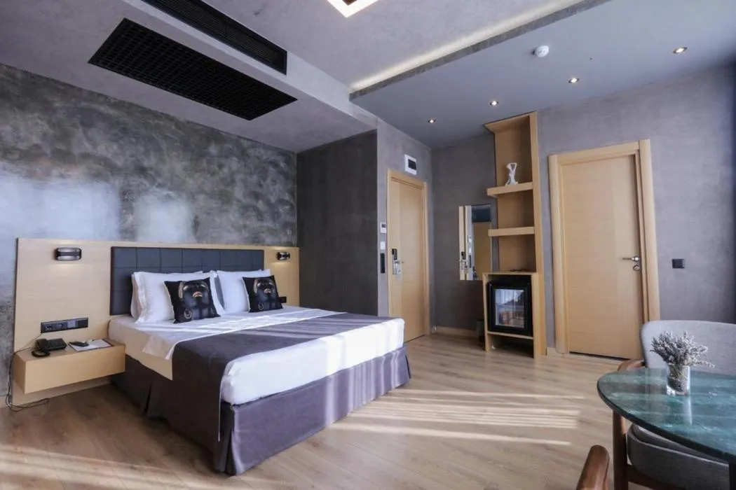 Bed in Red Stone Hotel