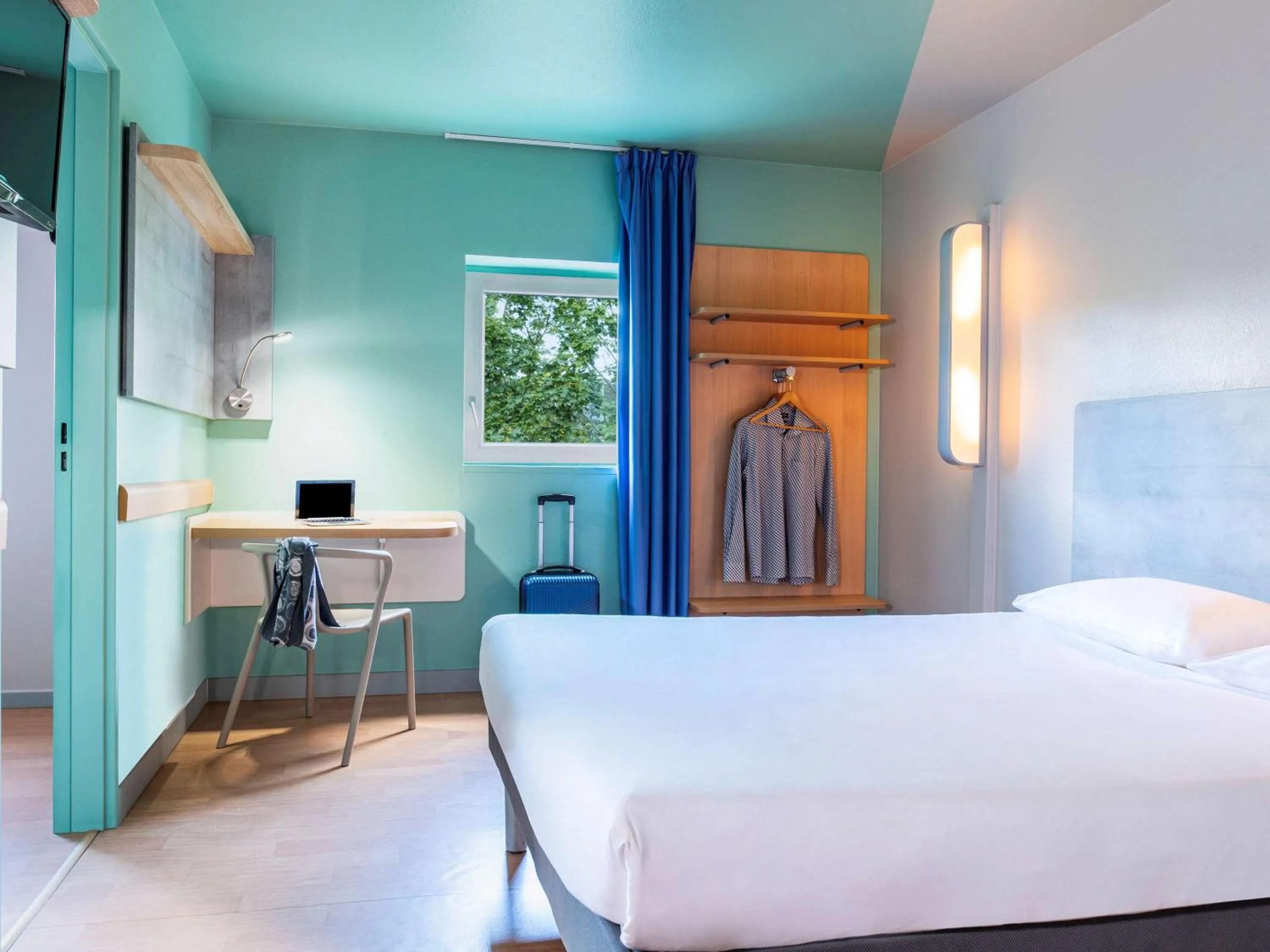 Photo of the whole room, Bed in ibis budget Grigny Centre