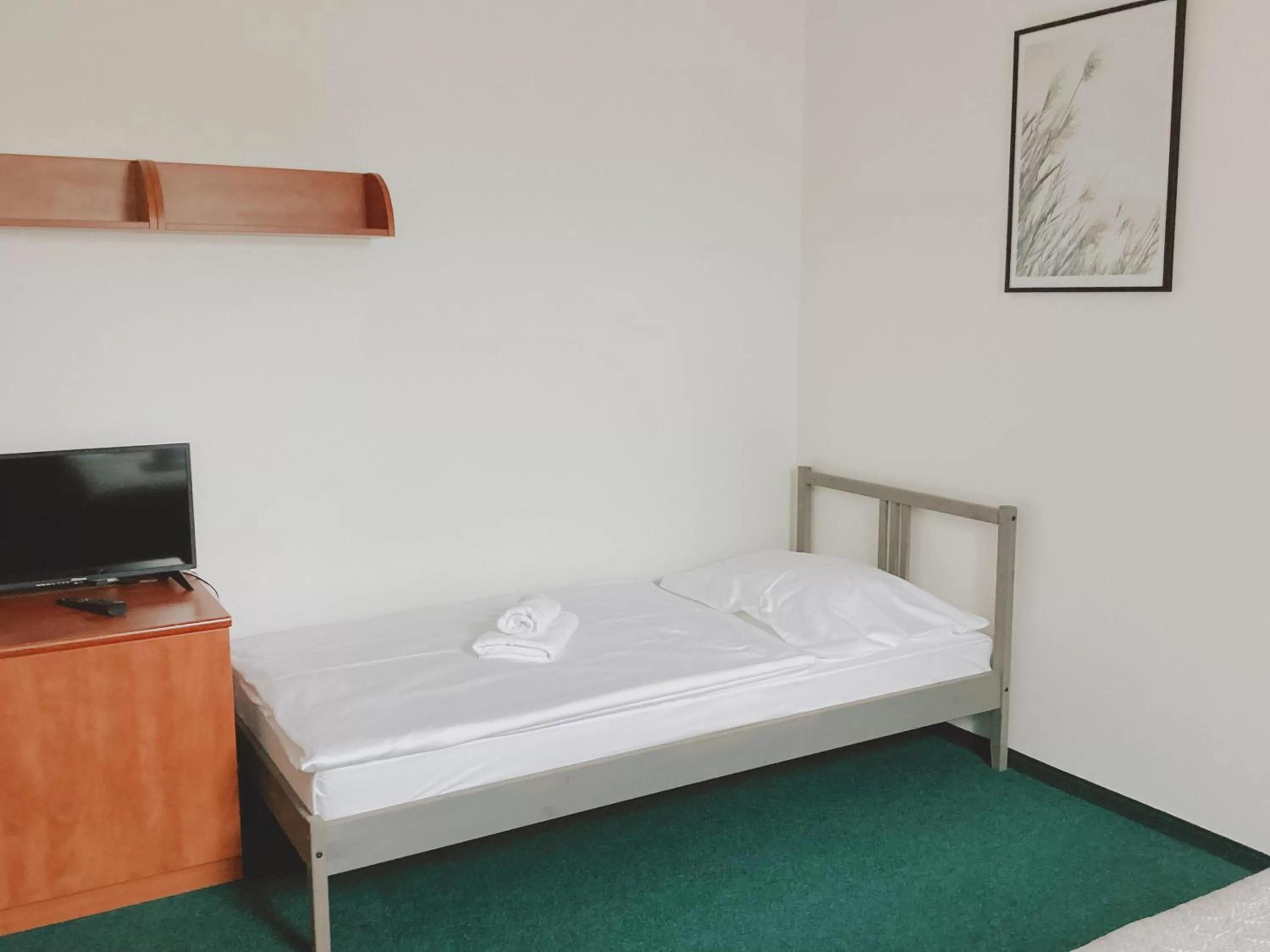 Bed in Hotel Karolina