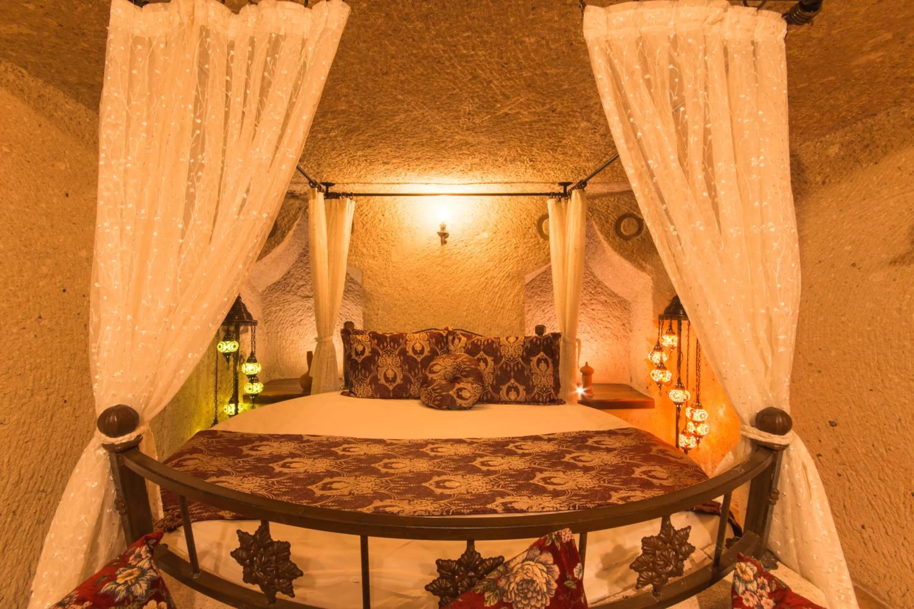 Bed in Adora Cave Suites -