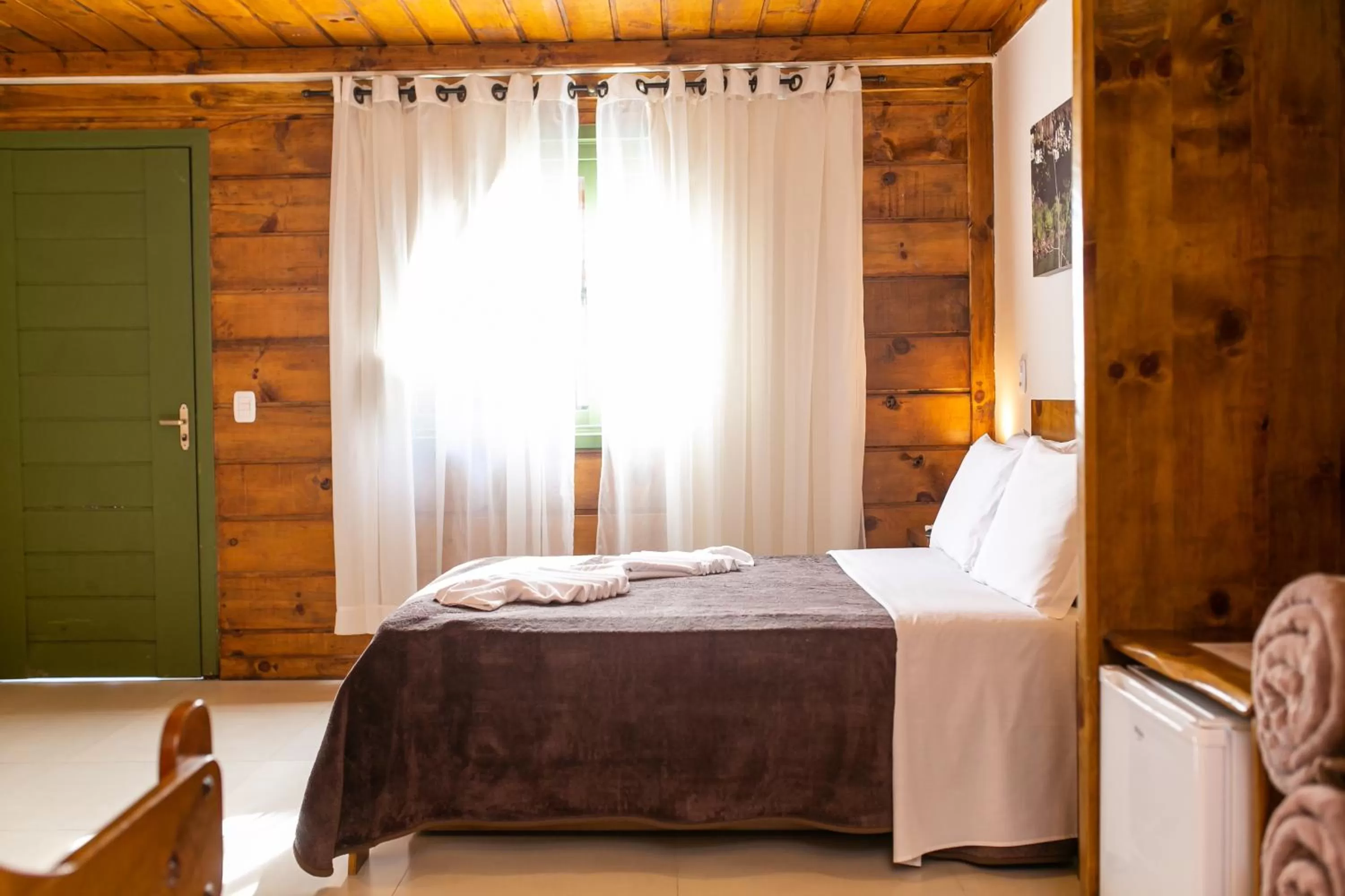 Bed in Pousada Charm Canela