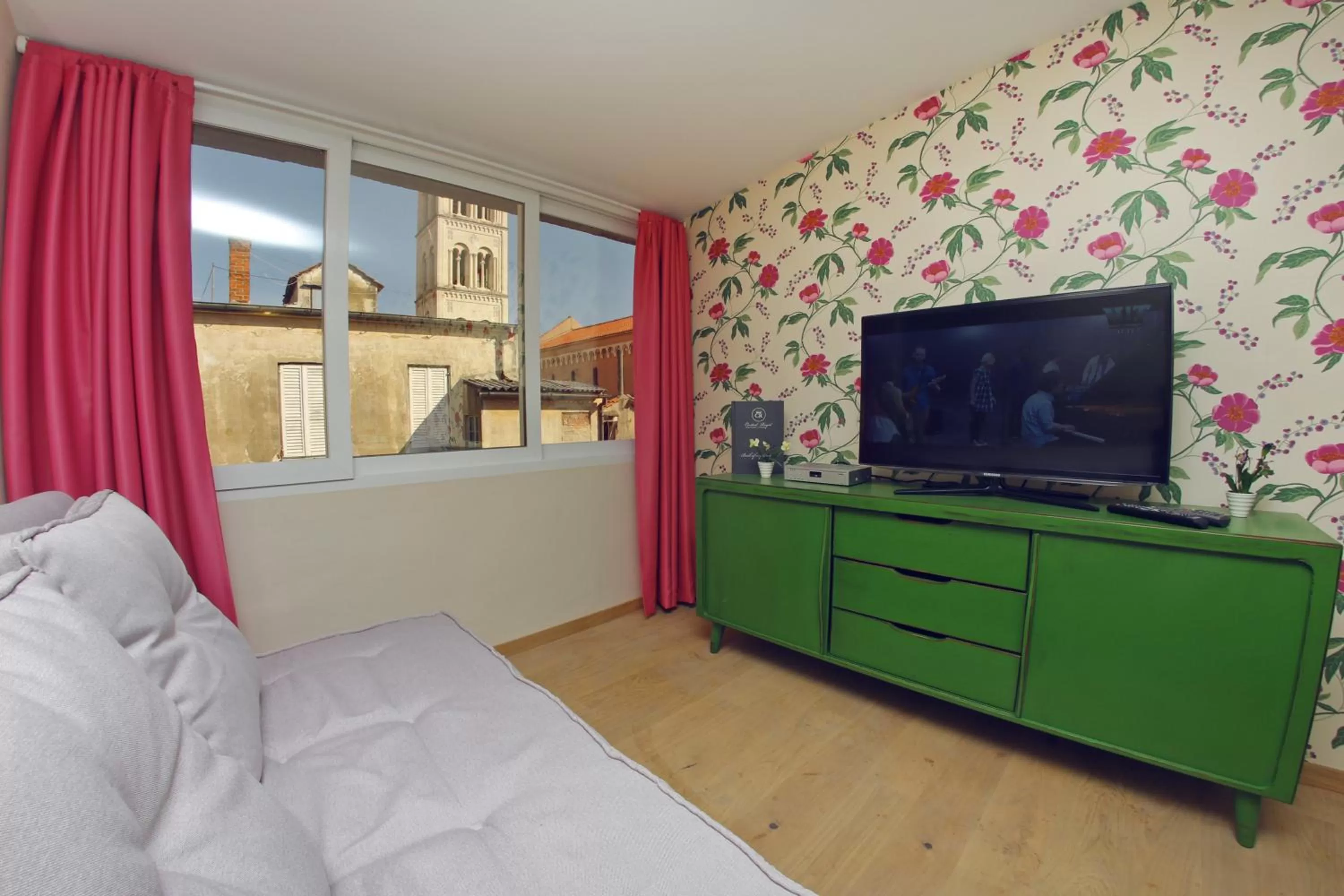 TV and multimedia in Central Apartments Integrated Hotel