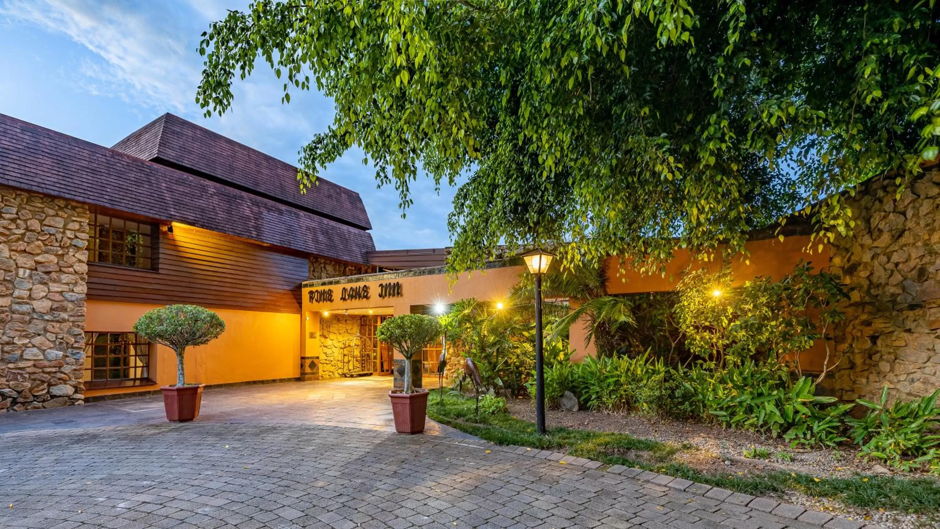 Property building in African Sky Hotels - Pine Lake Inn