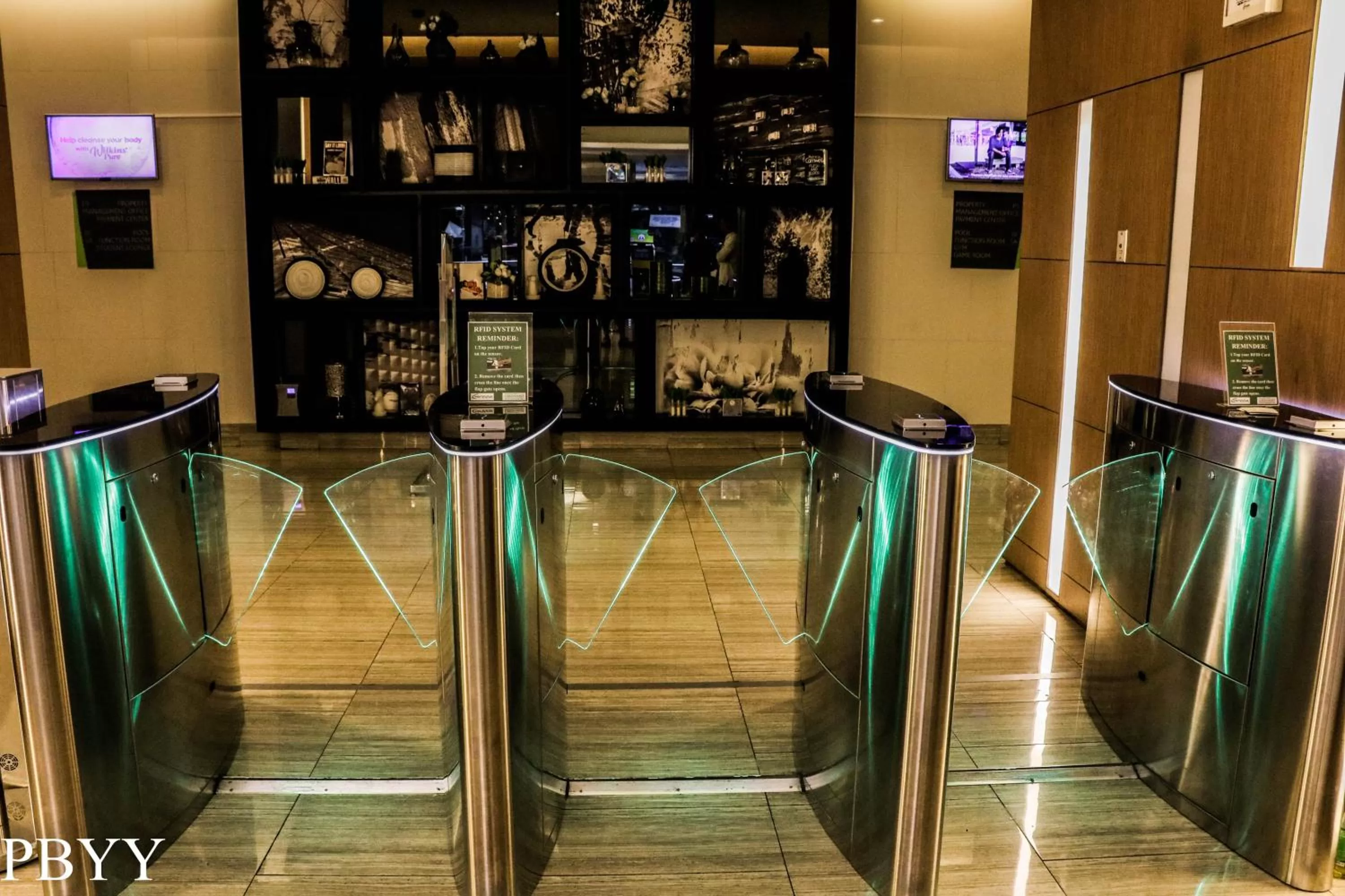 Facade/entrance in Green Residences Stays by PBYY