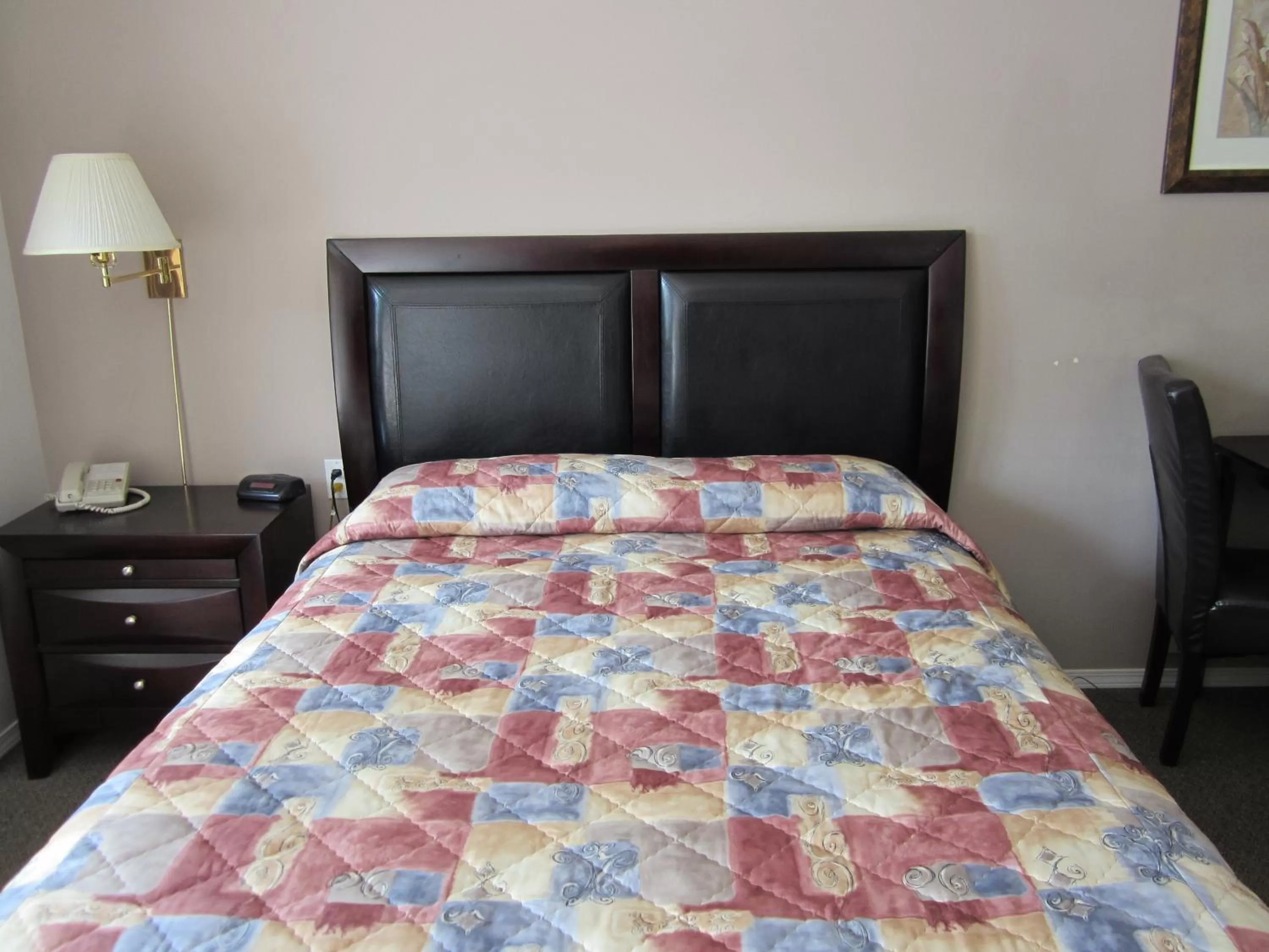 Bed in Monte Carlo Motel