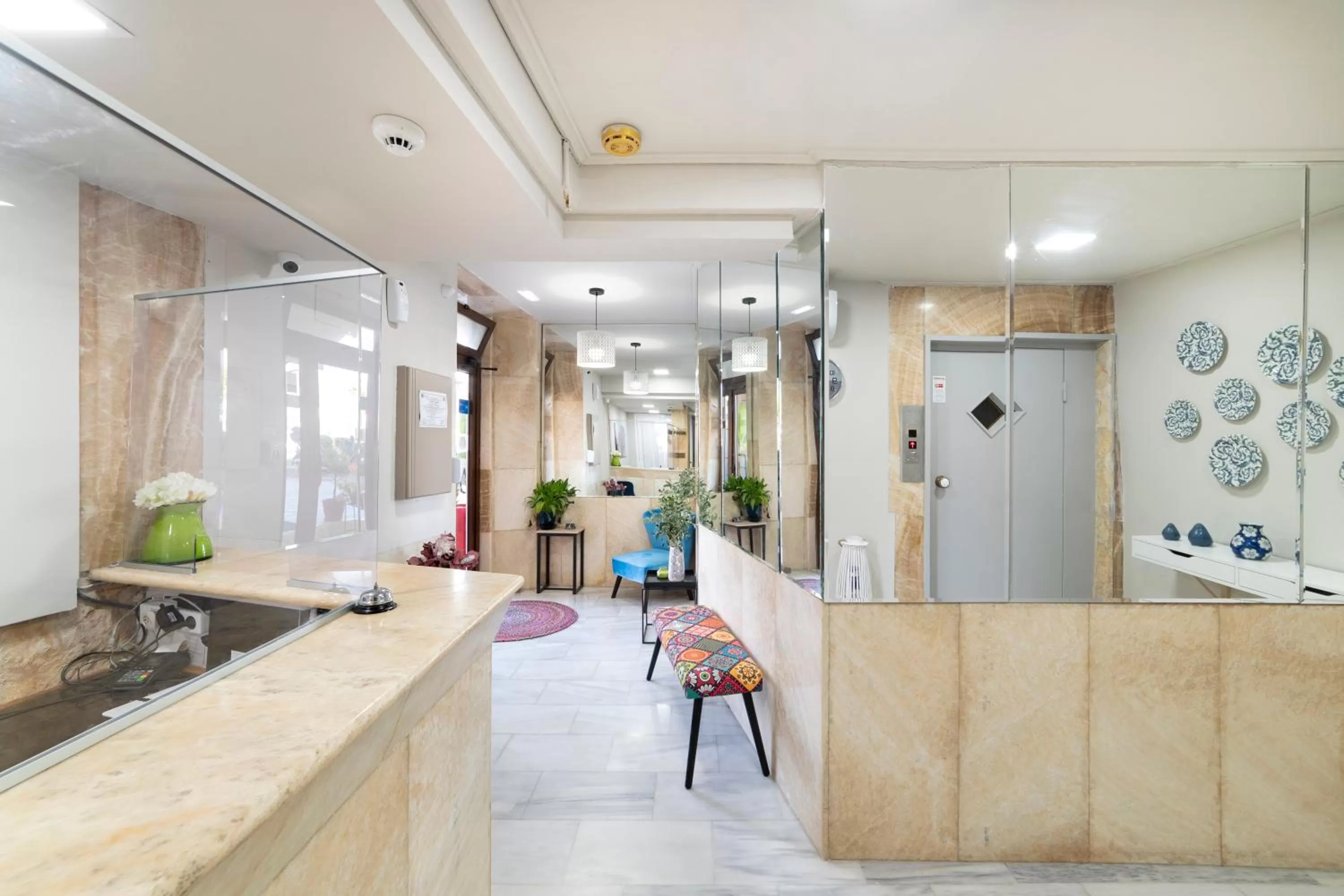 Lobby or reception in Faros Rooms
