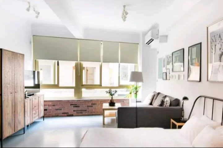 Seating Area in Explore a New Arts District from a Hip Studio Flat