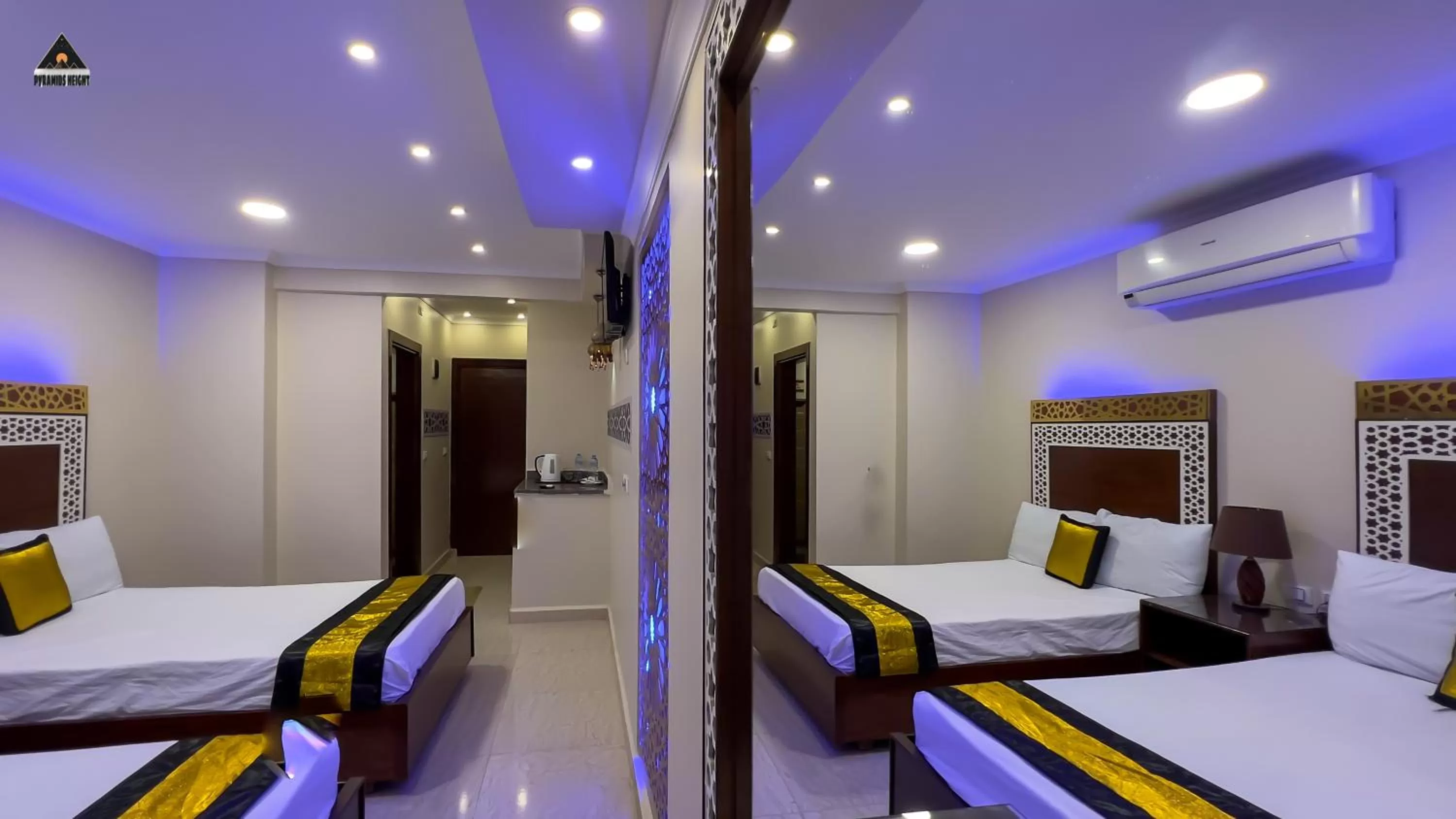 Bed in Pyramids Height Hotel & Pyramids Master Scene Rooftop