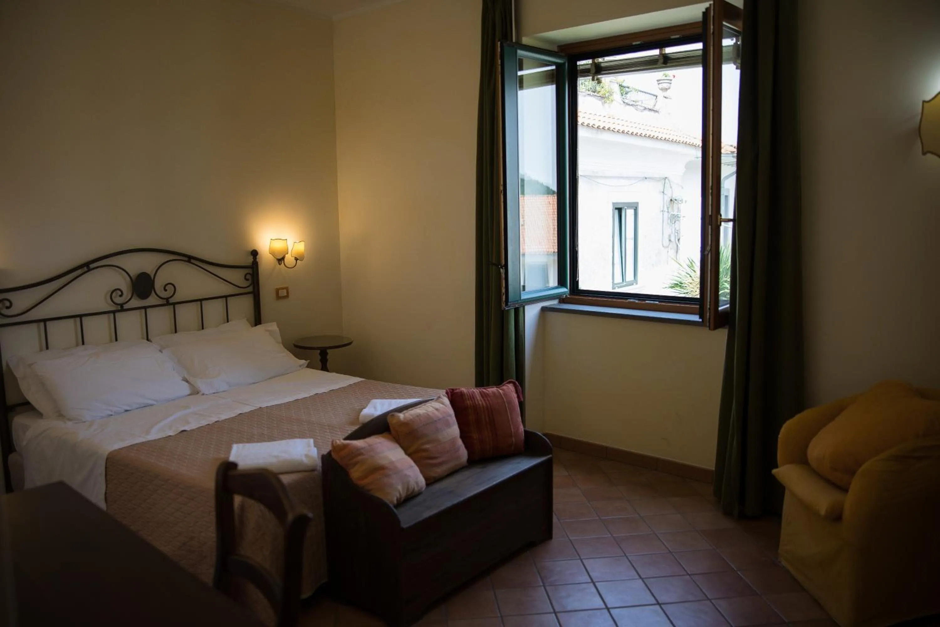 Bed in Hotel Scapolatiello