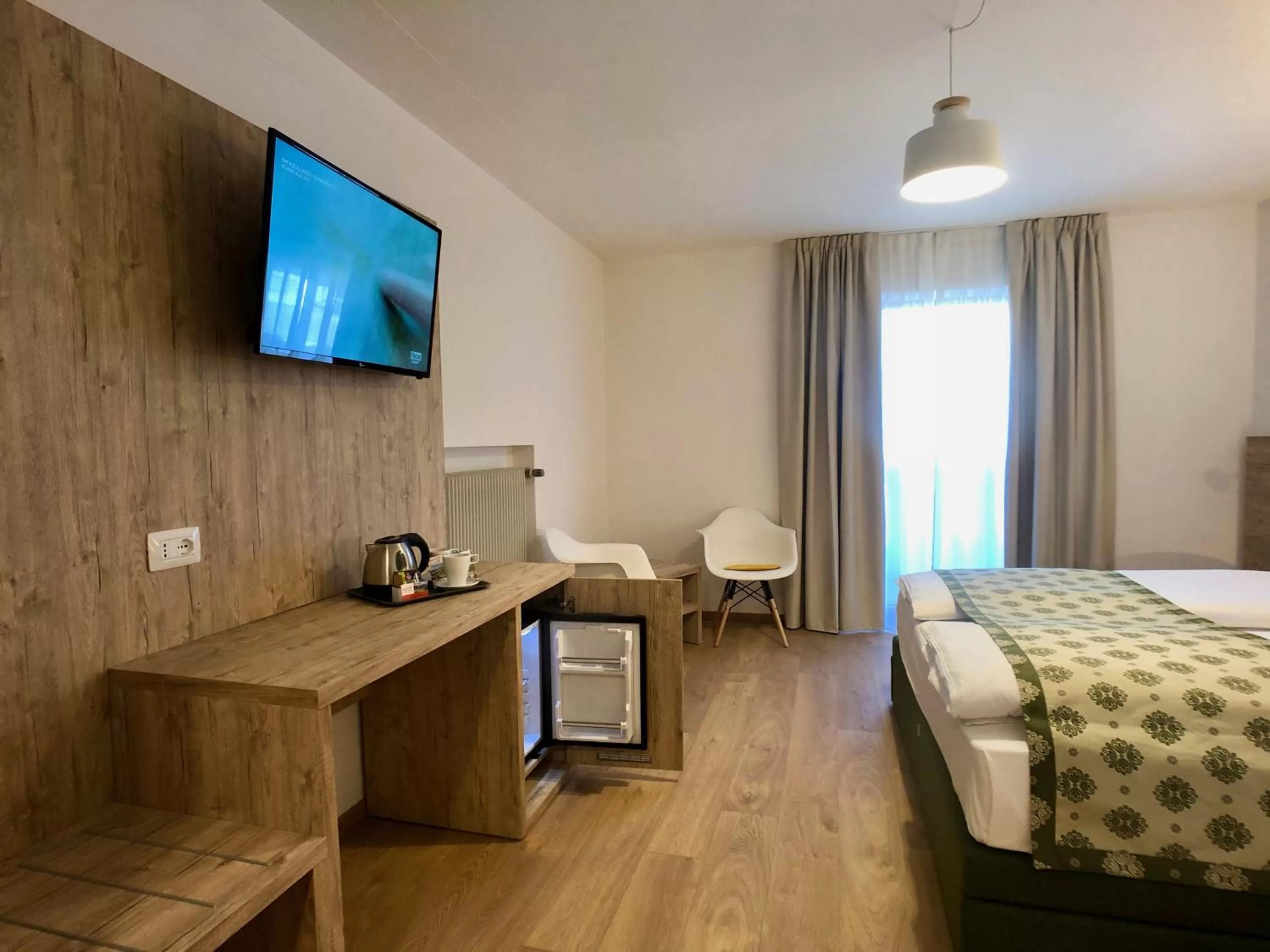 Bed in Hotel Kronplatzer Hof