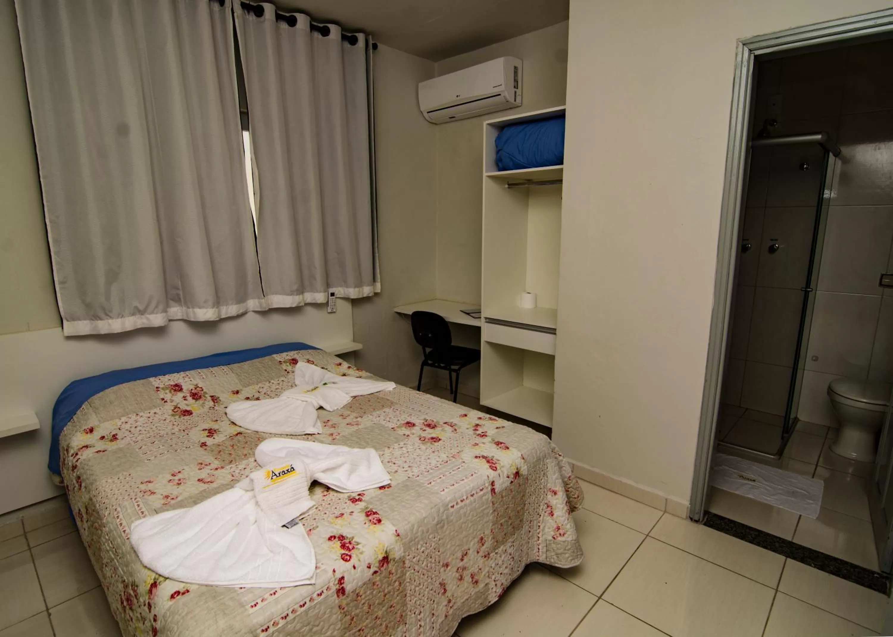 Bed in Pousada Araxá