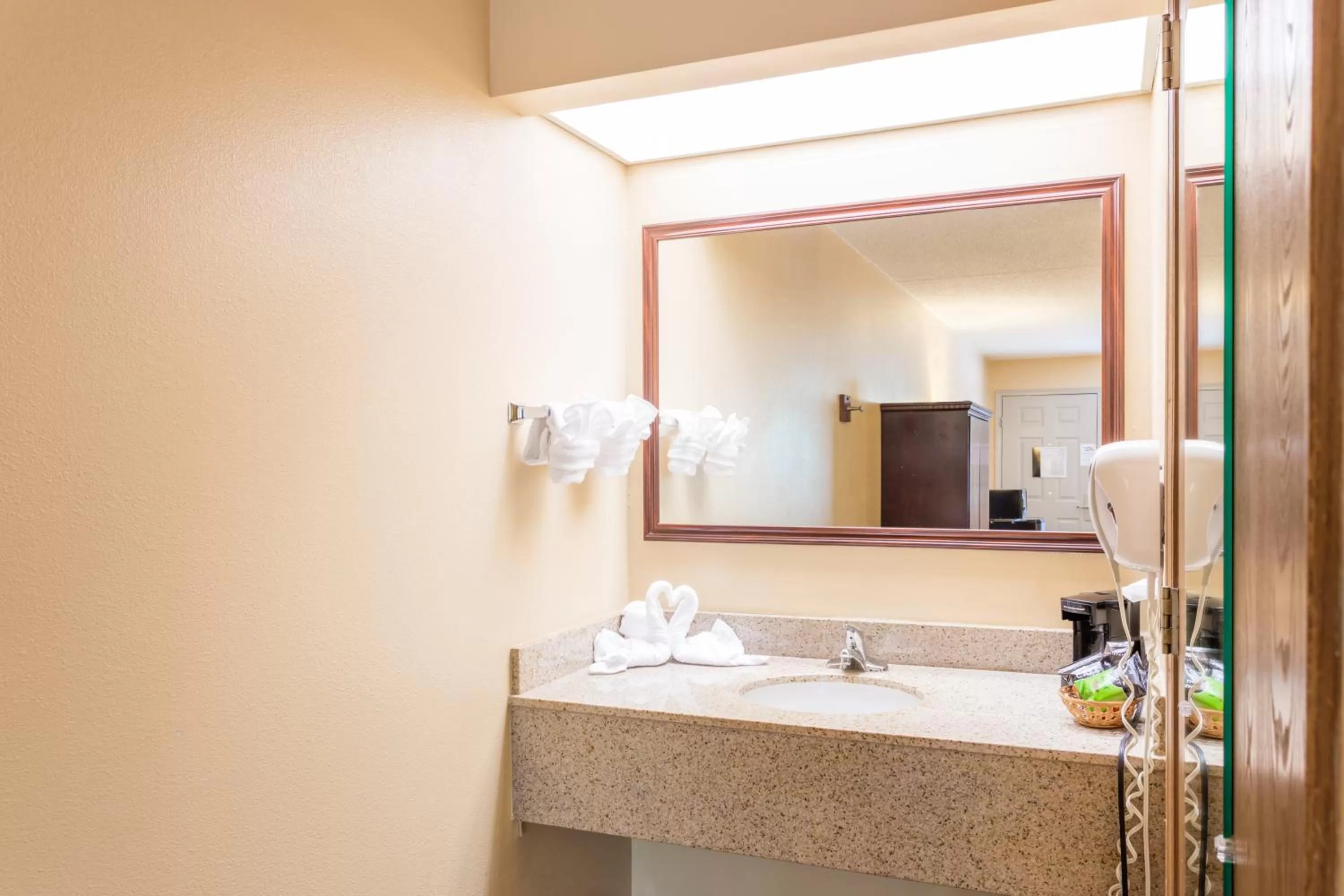 Premiere King Bed with Roll- In Shower in Angel Inn - Central