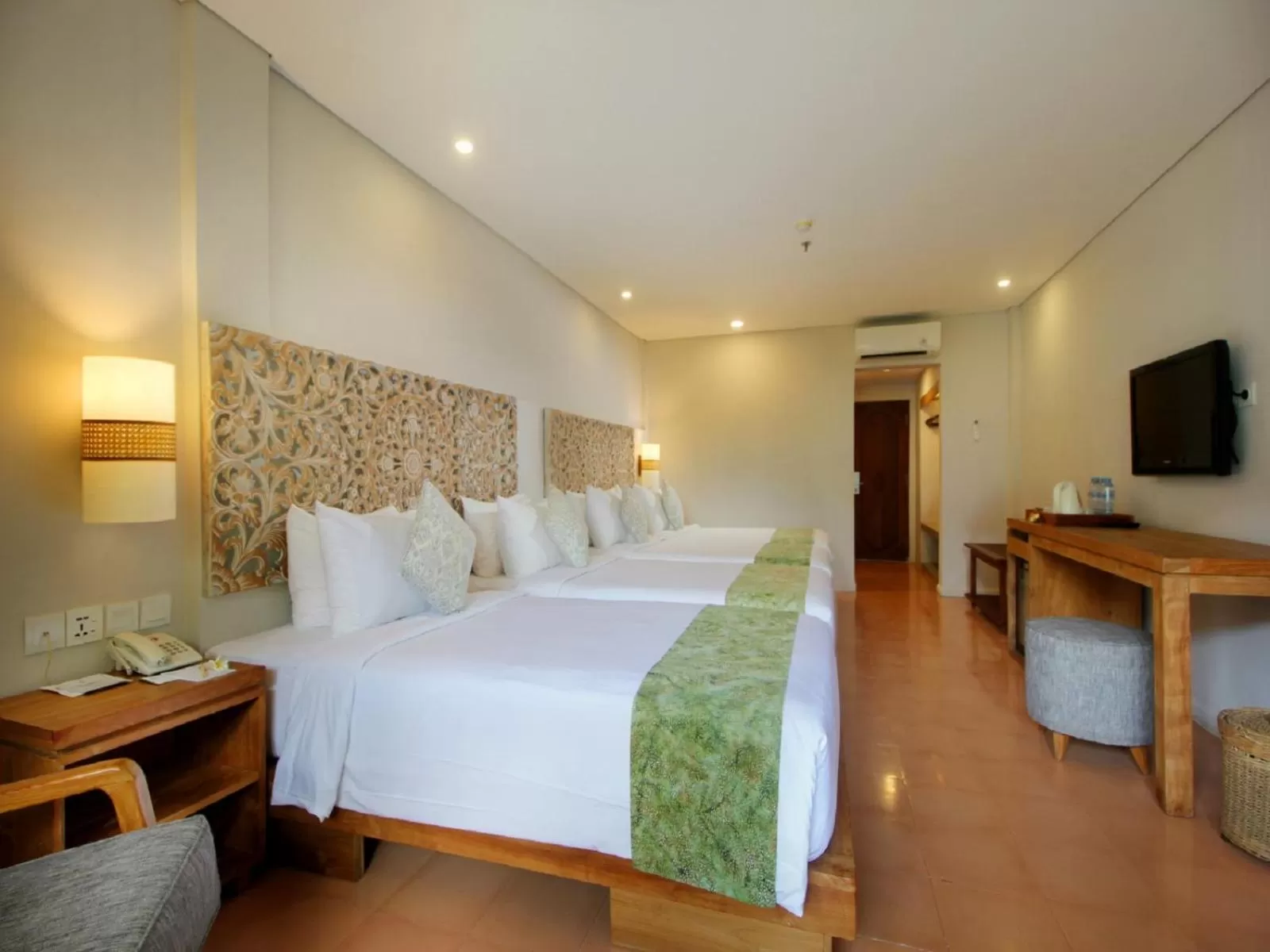 Bed in AlamKulkul Boutique Resort