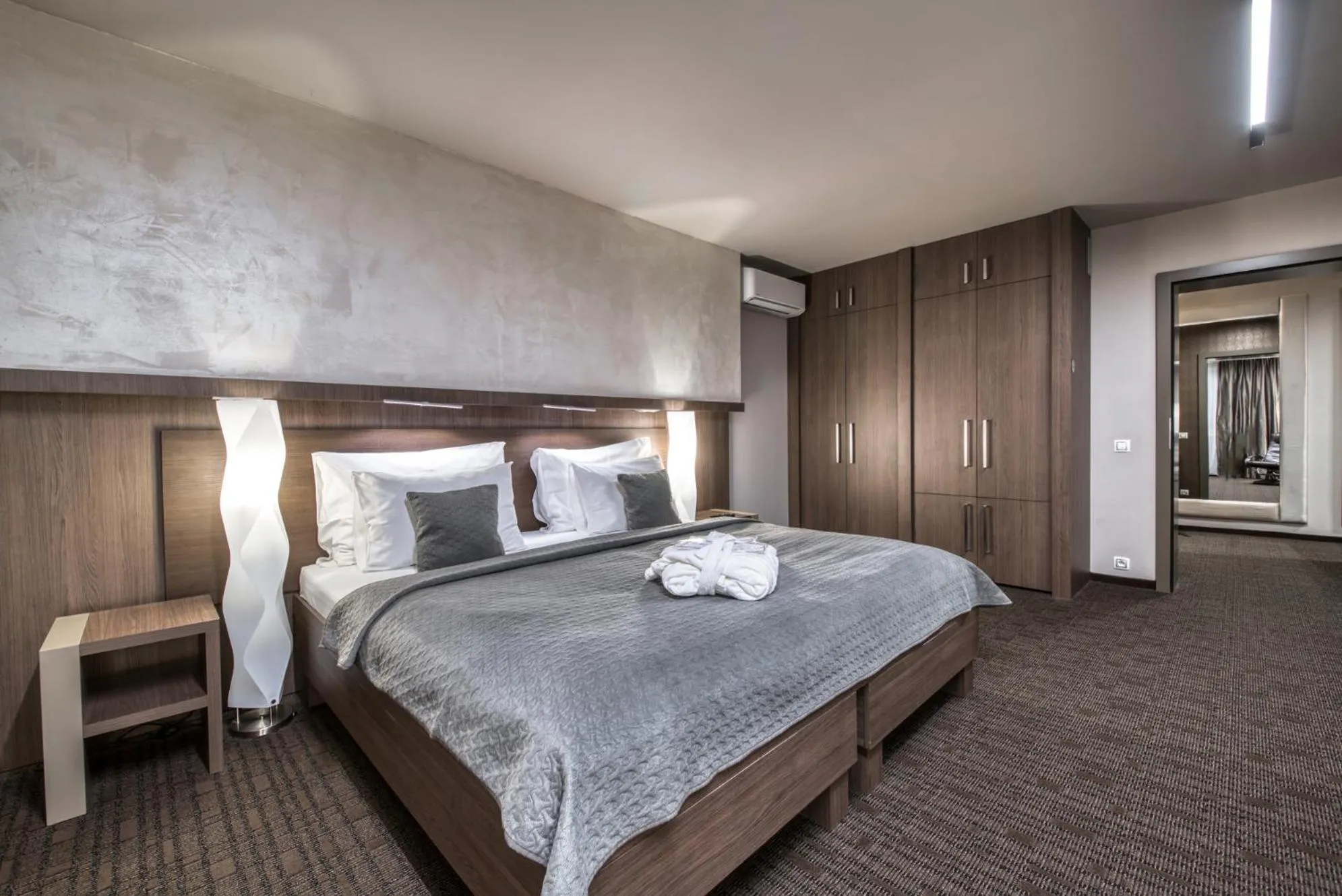 Bed in Volcano Spa Hotel