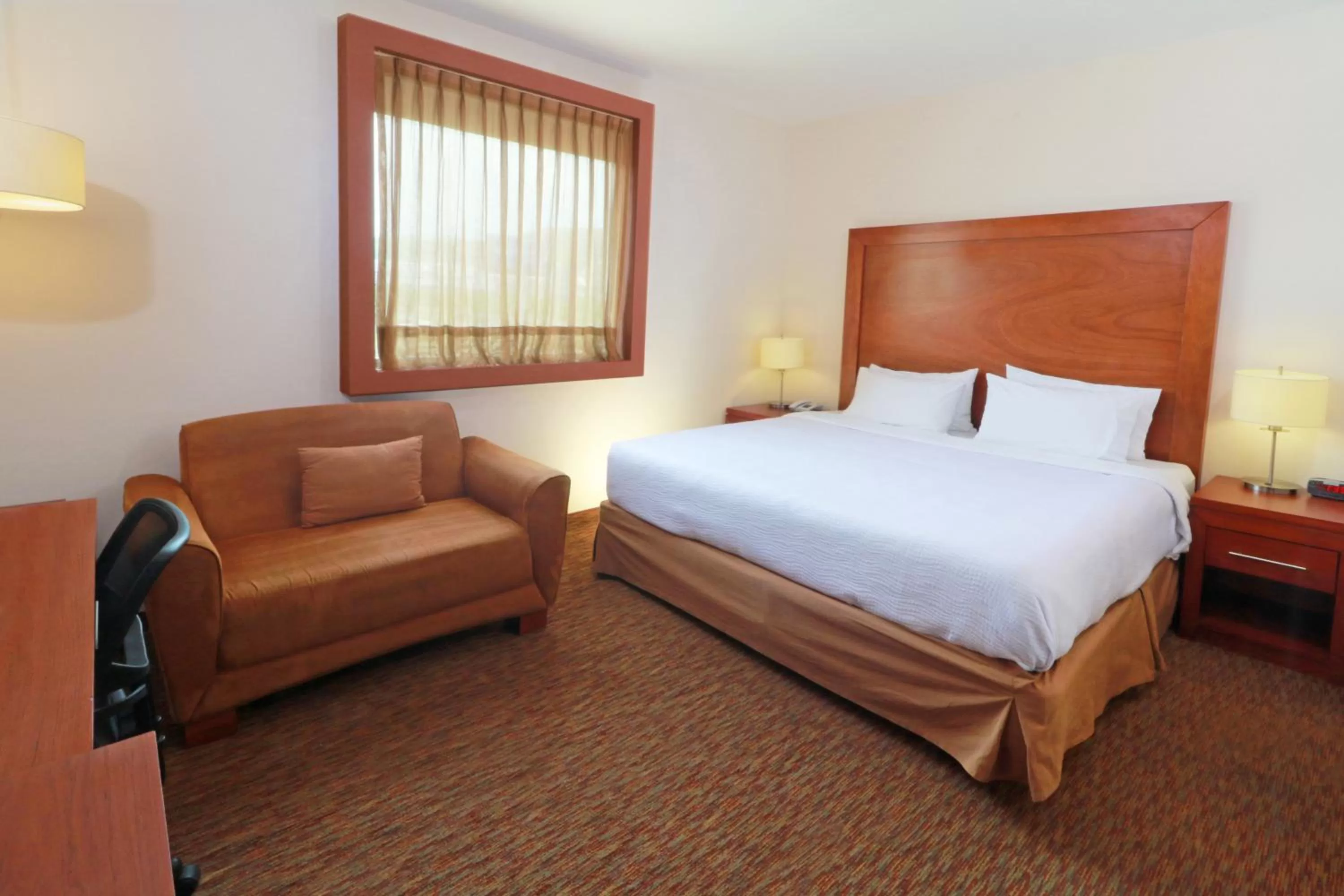 Photo of the whole room, Bed in Staybridge Suites Queretaro by IHG
