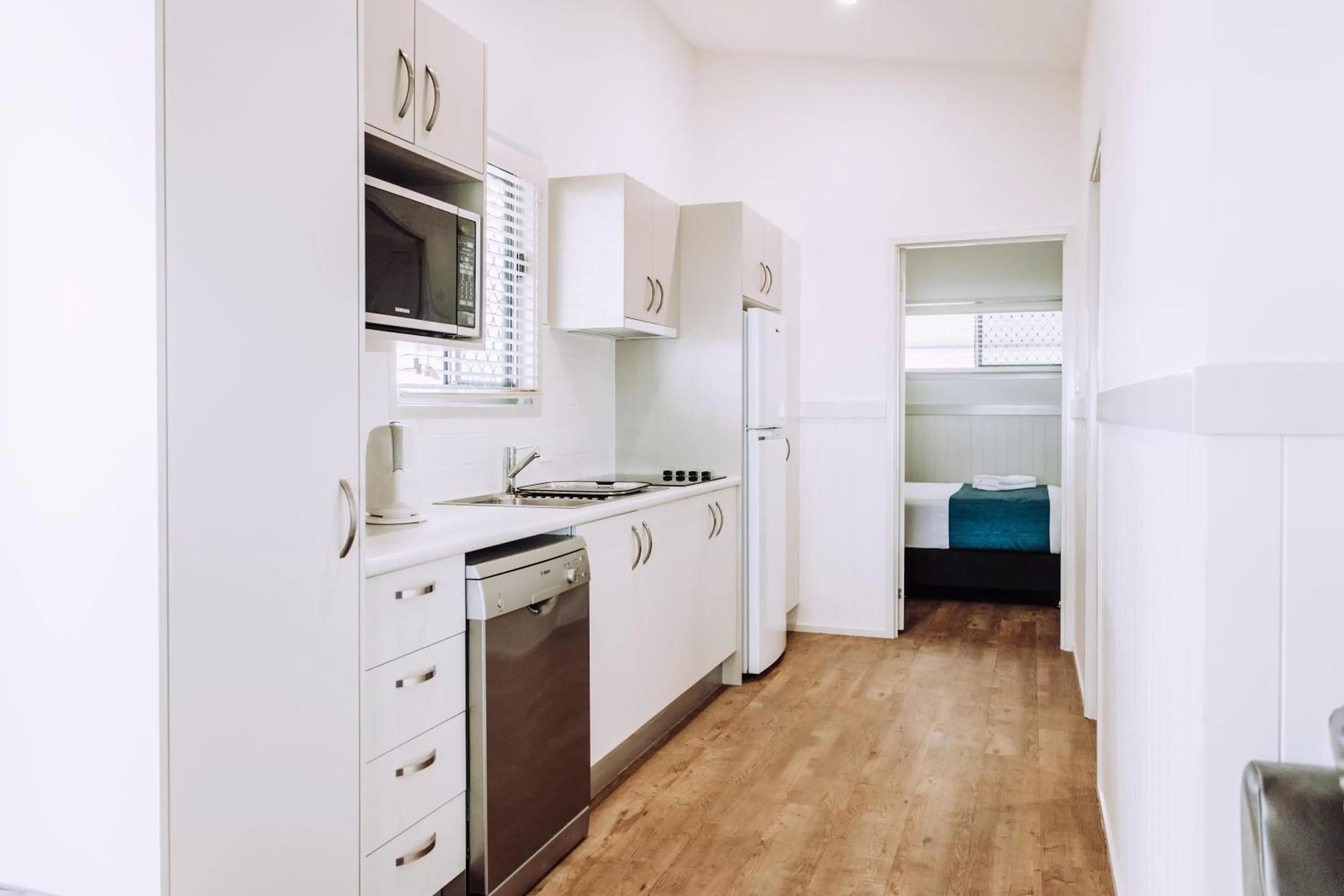 Kitchen or kitchenette in Woolgoolga Beach Holiday Park